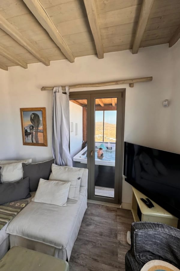 a living room with a couch and a tv