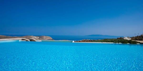 a body of water with land in the distance