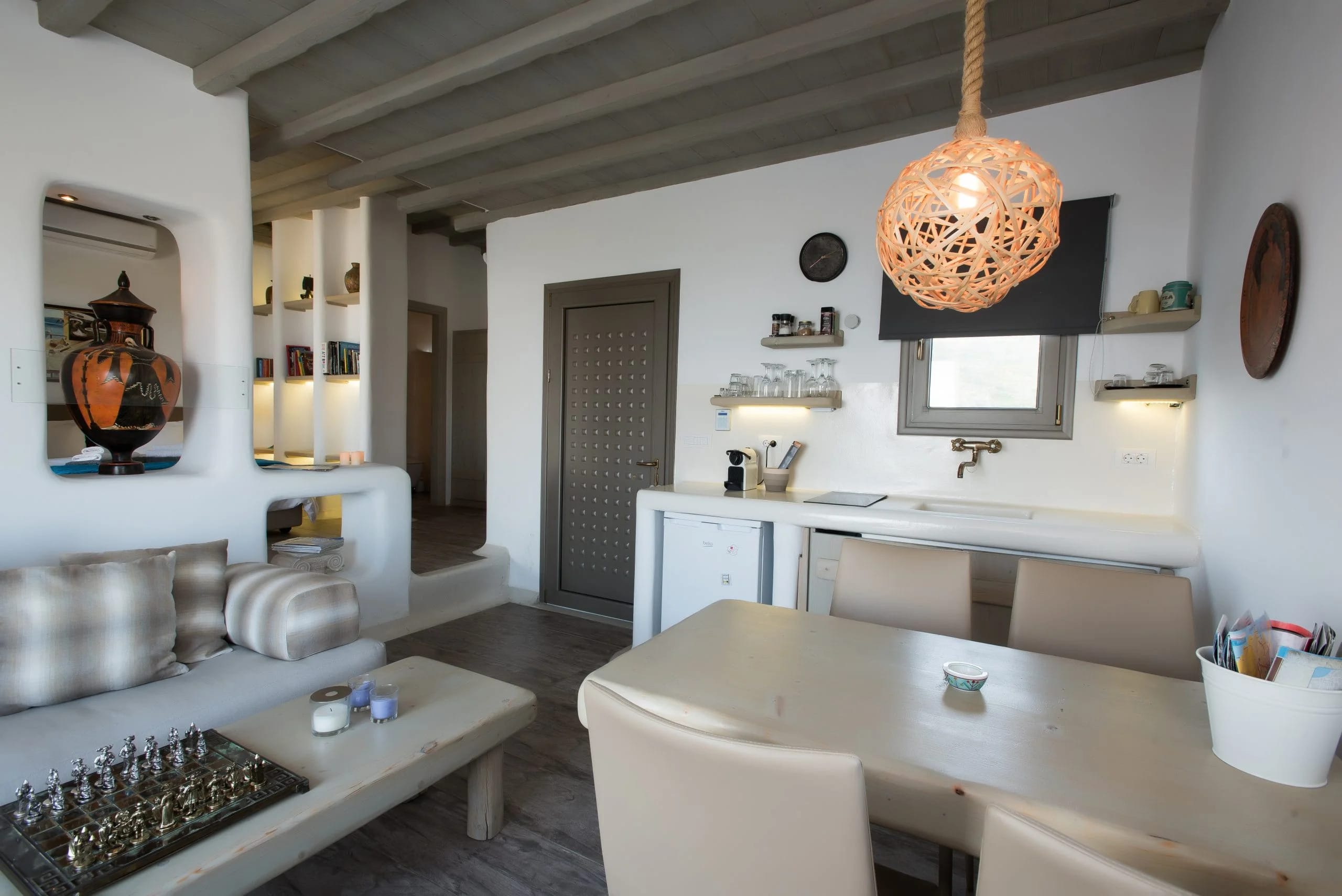 a kitchen with a dining table