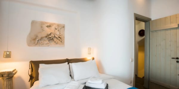 a bed with a blue blanket