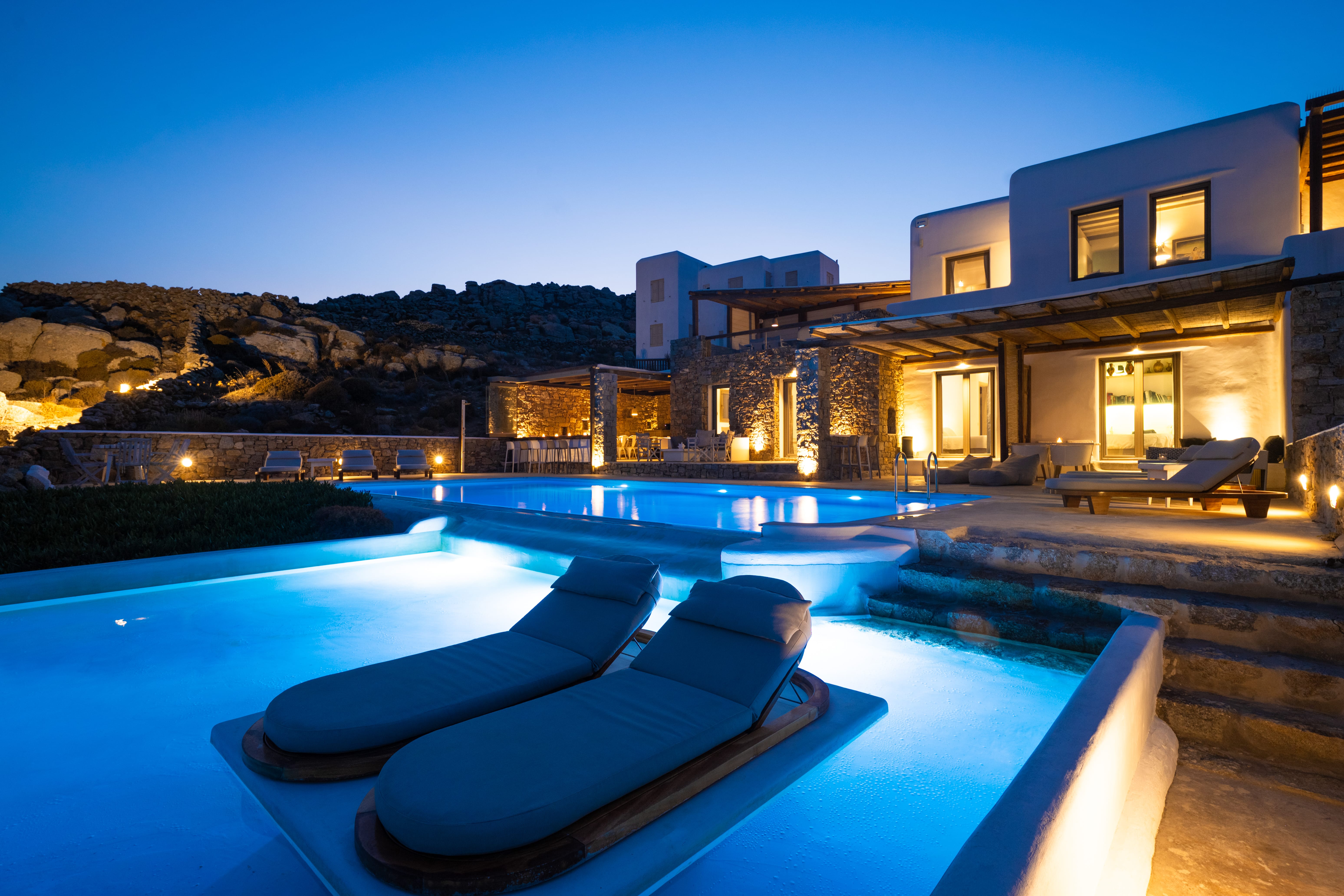 a pool in front of a house