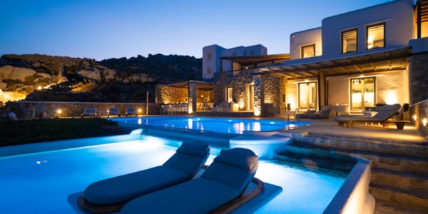 a pool in front of a house