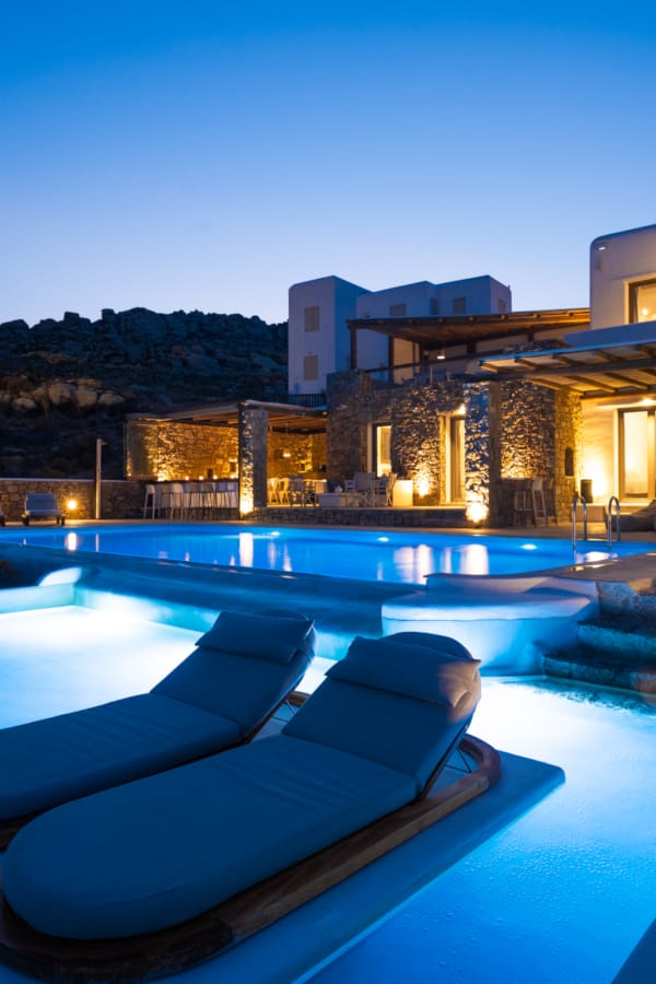 a pool in front of a house