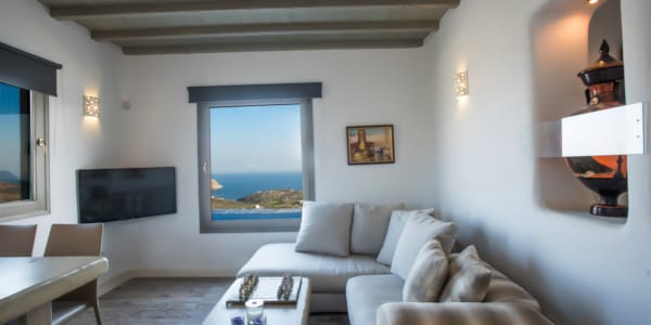 a living room with a large painting