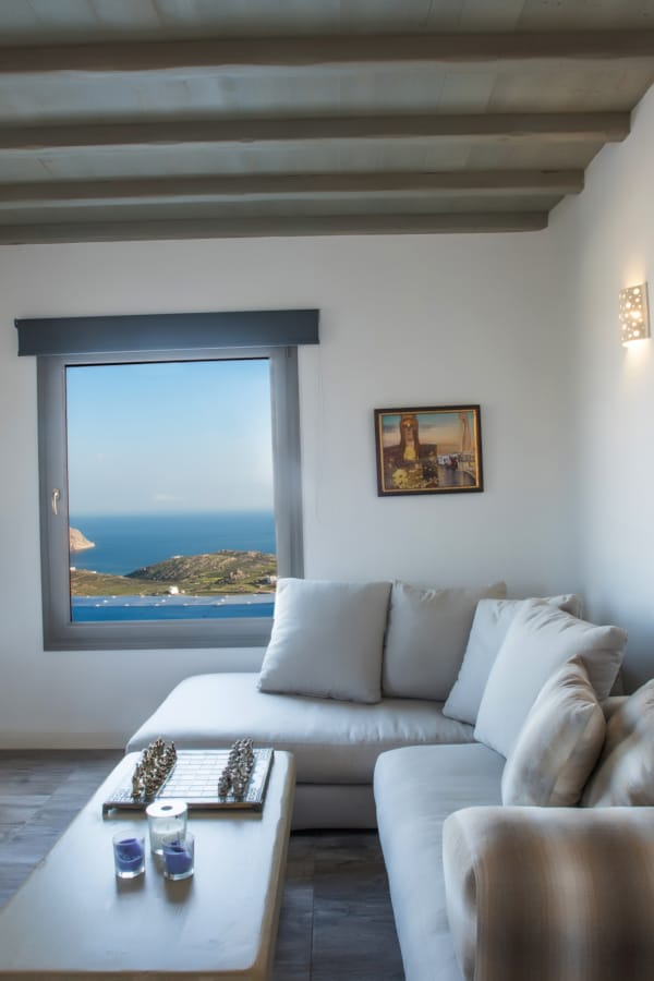 a living room with a large painting