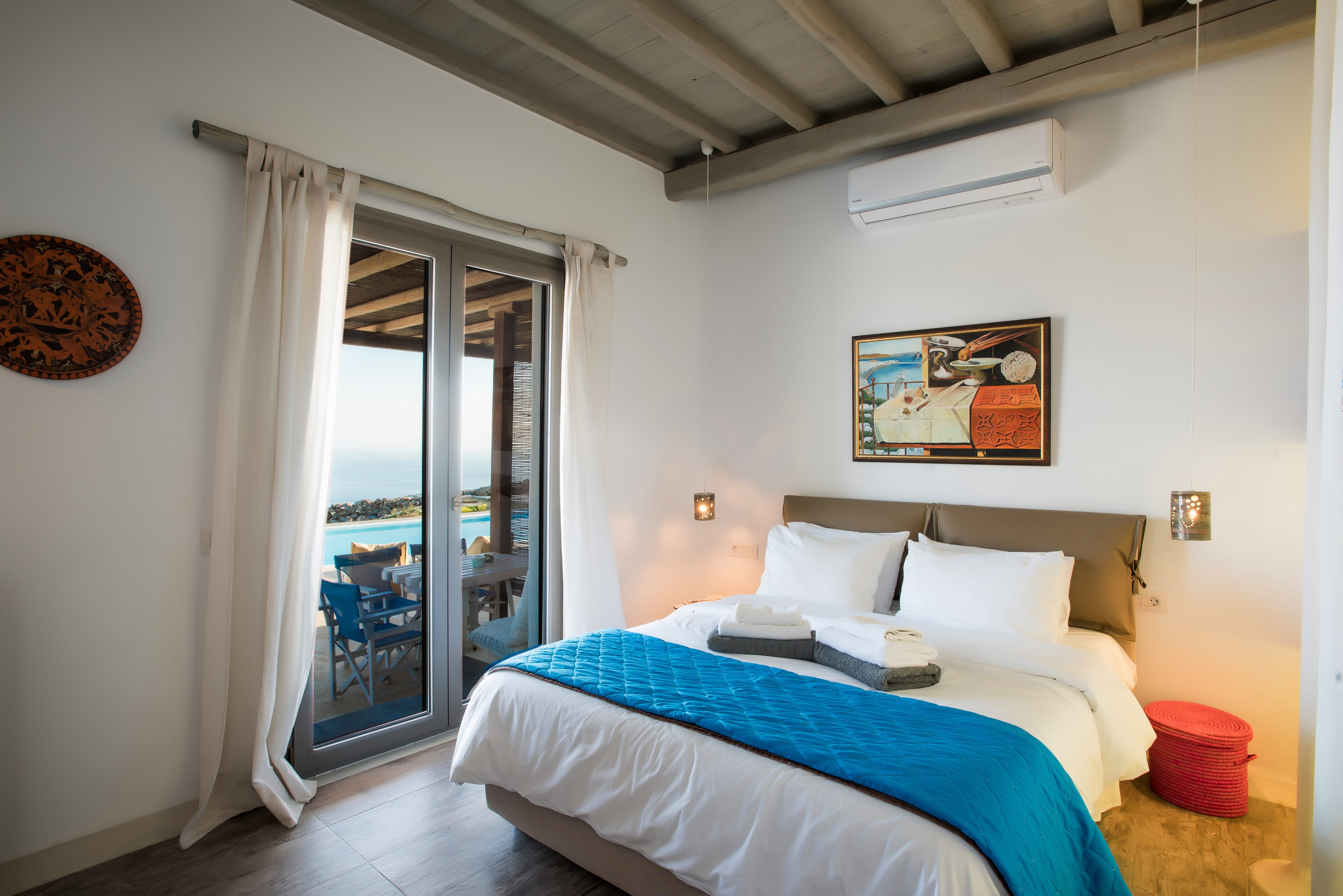 a bedroom with a bed and a door