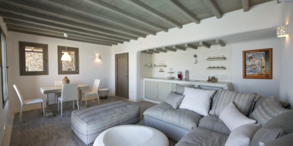 a living room with a couch and a table