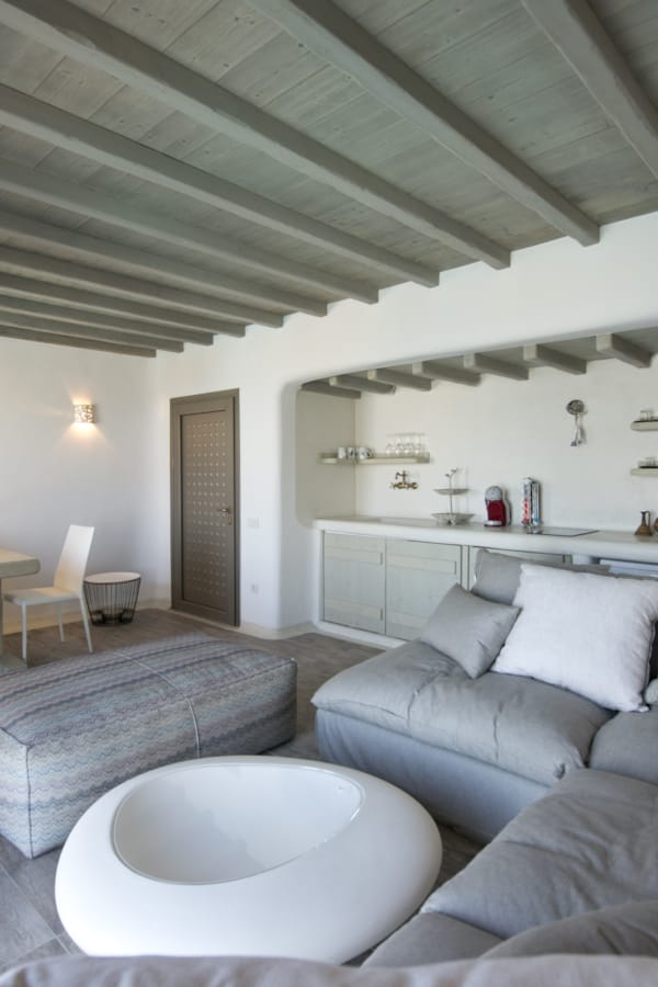 a living room with a couch and a table