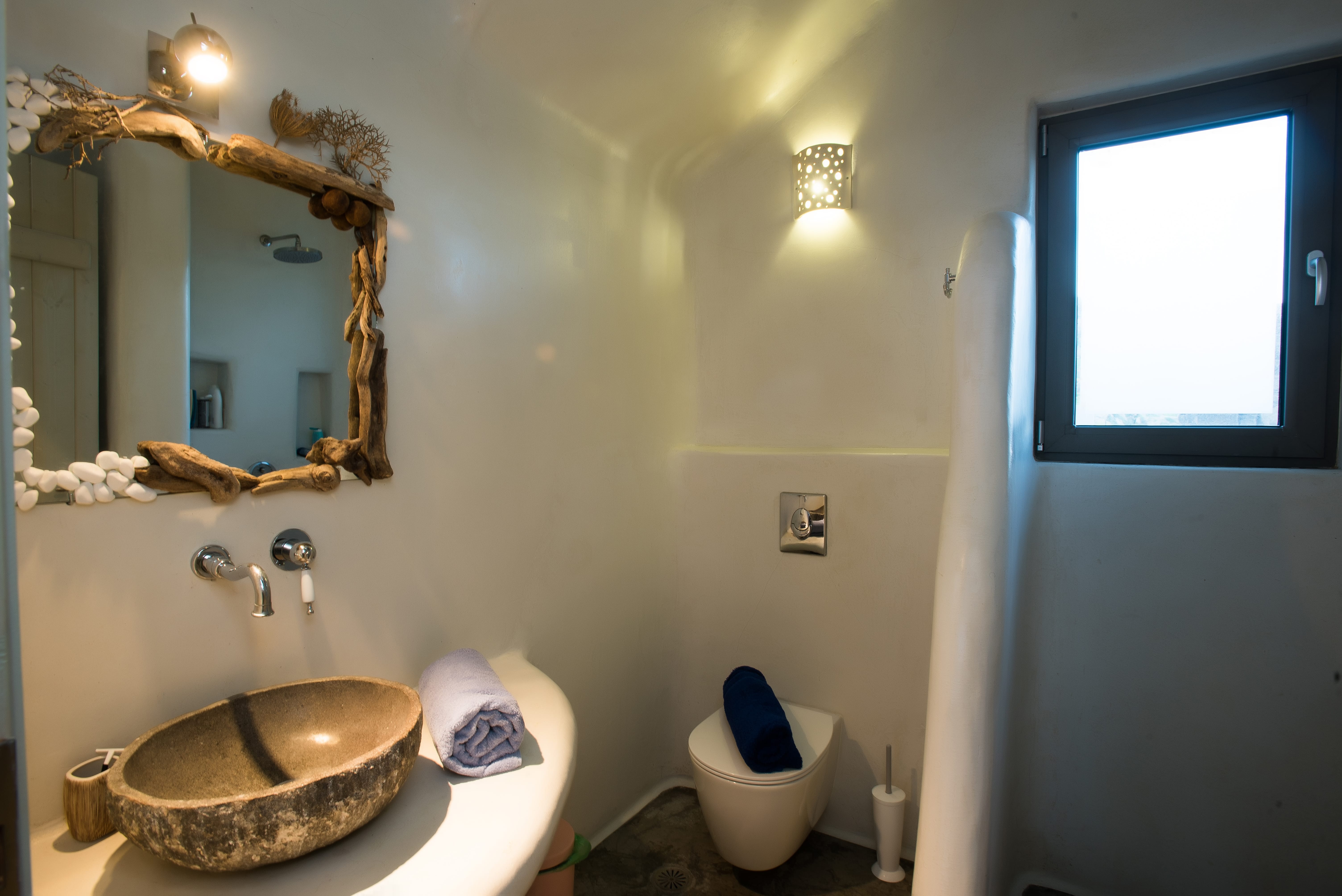 a bathroom with a large mirror