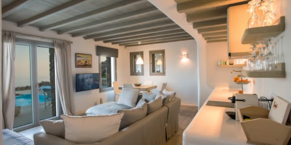 a living room with a couch and a table