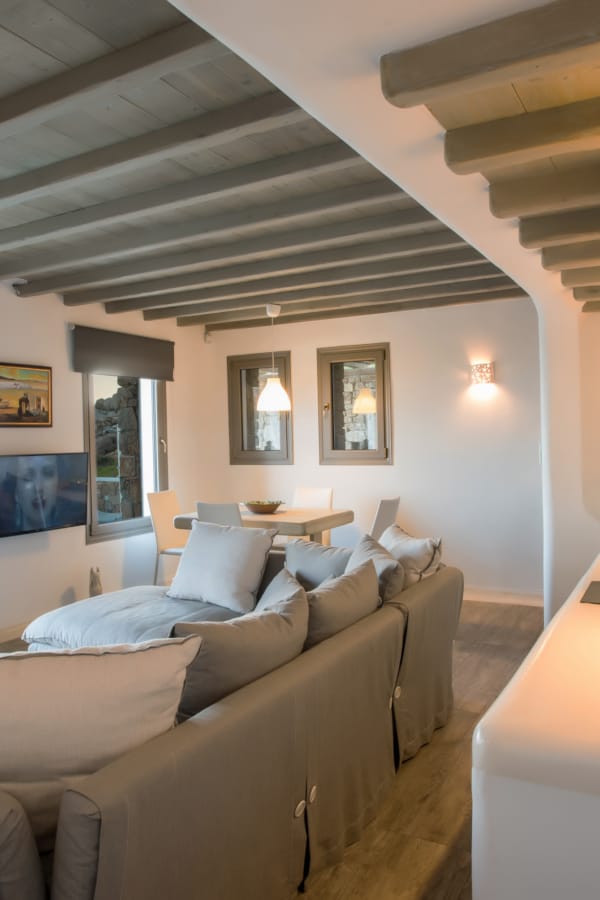 a living room with a couch and a table