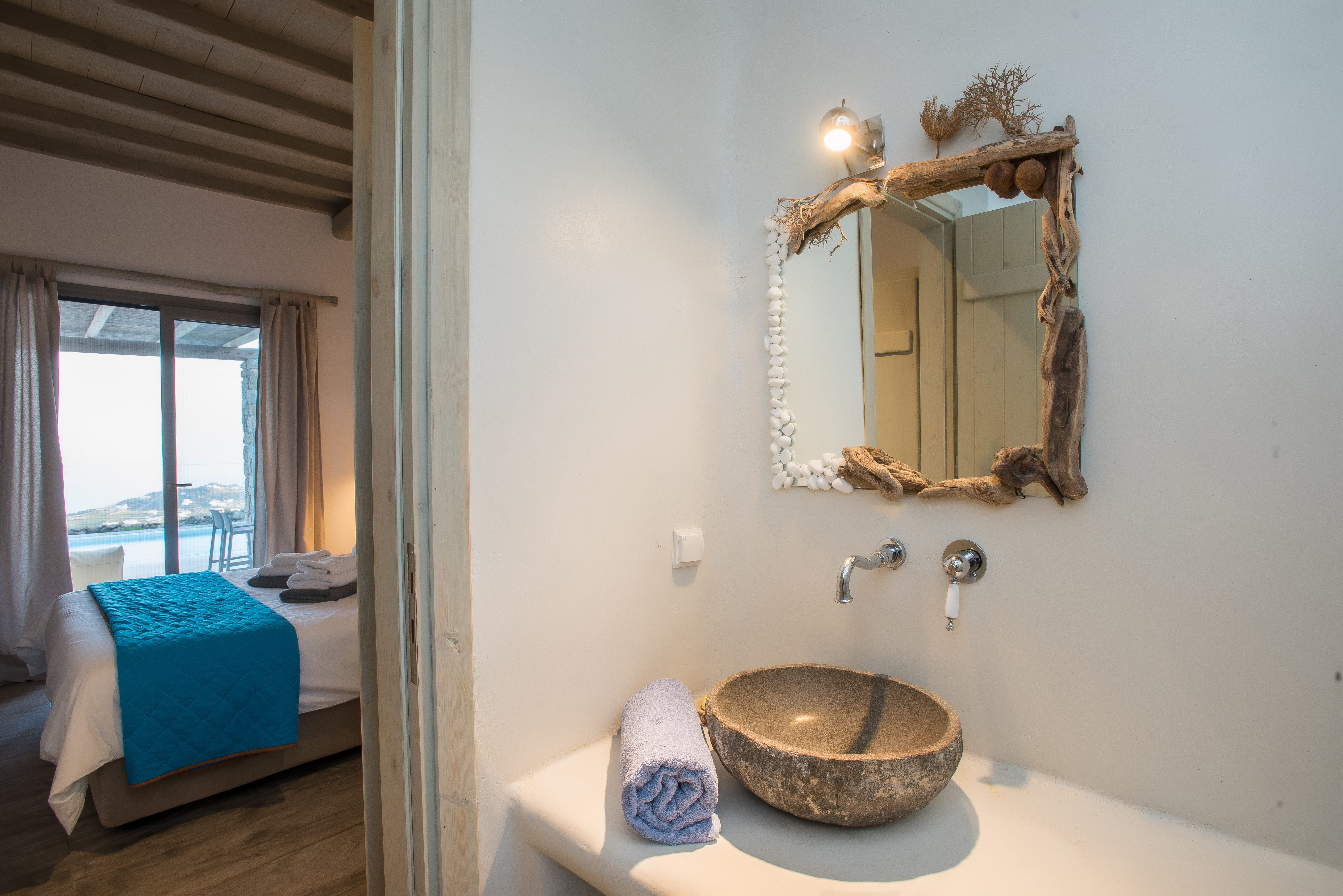 a bathroom with a large mirror