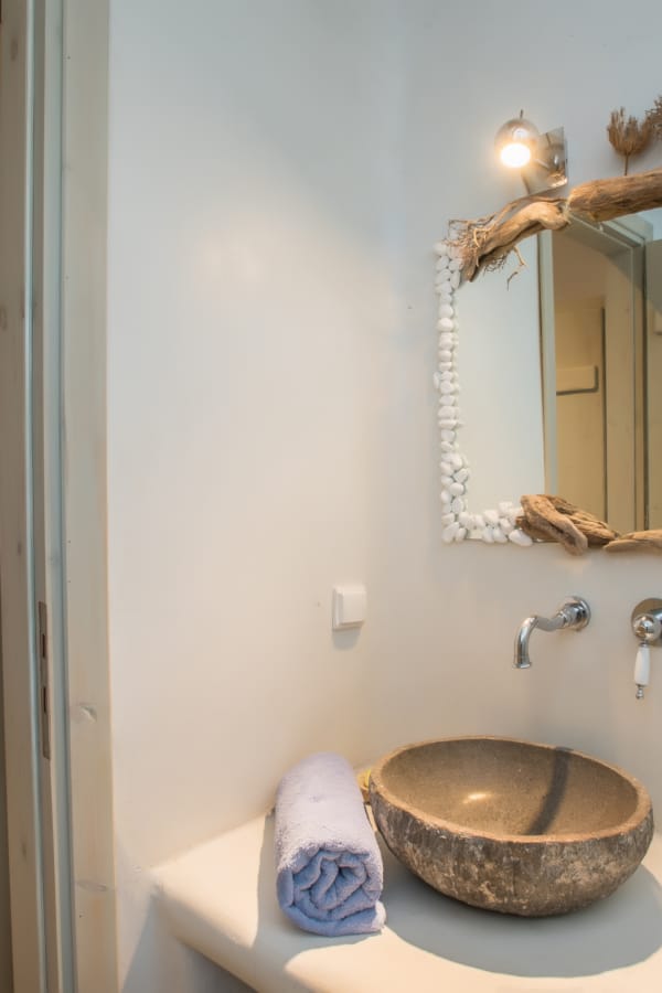 a bathroom with a large mirror