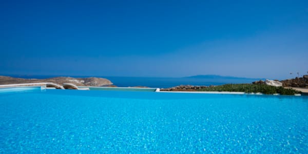 a body of water with land in the distance