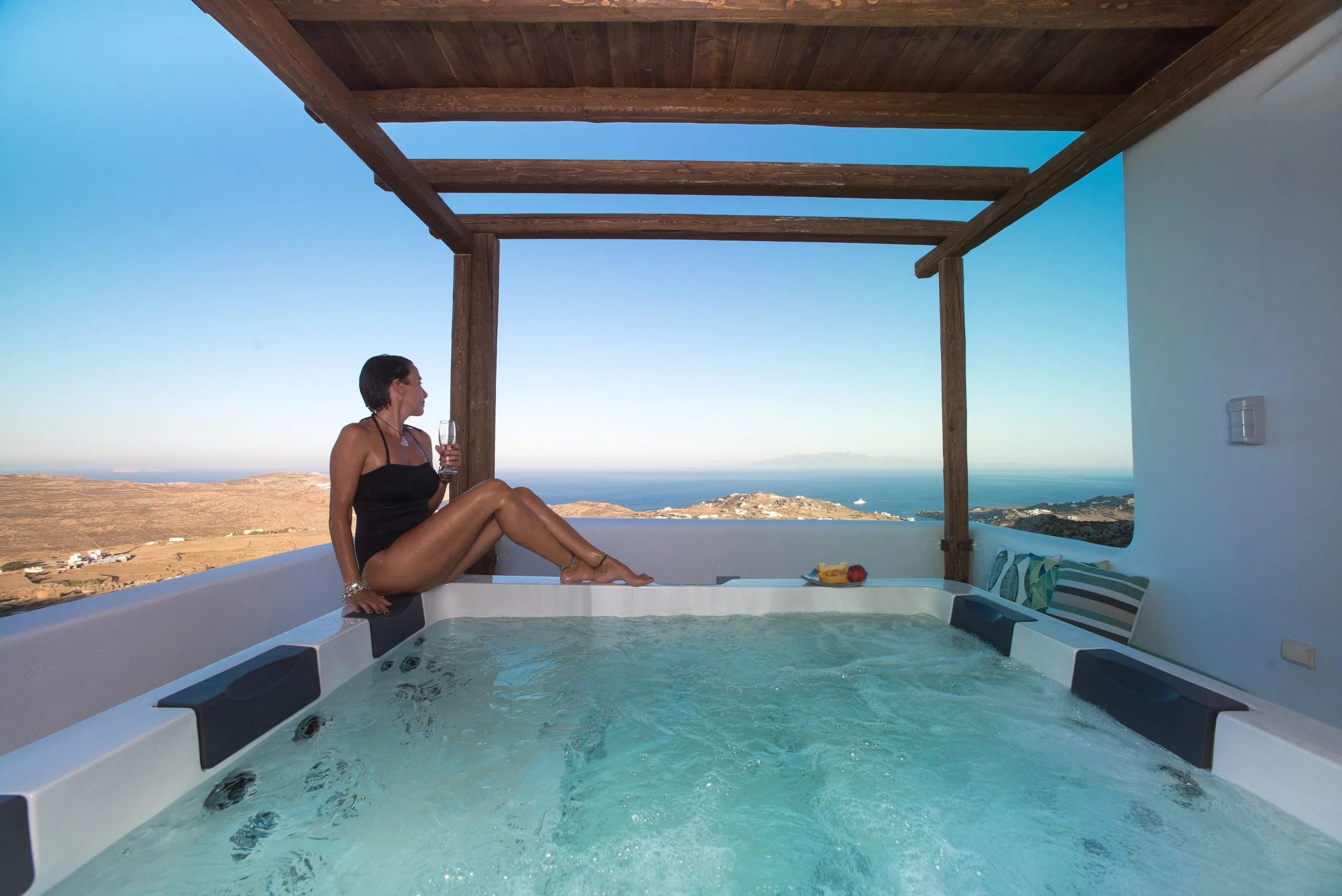 a man sitting on a pool