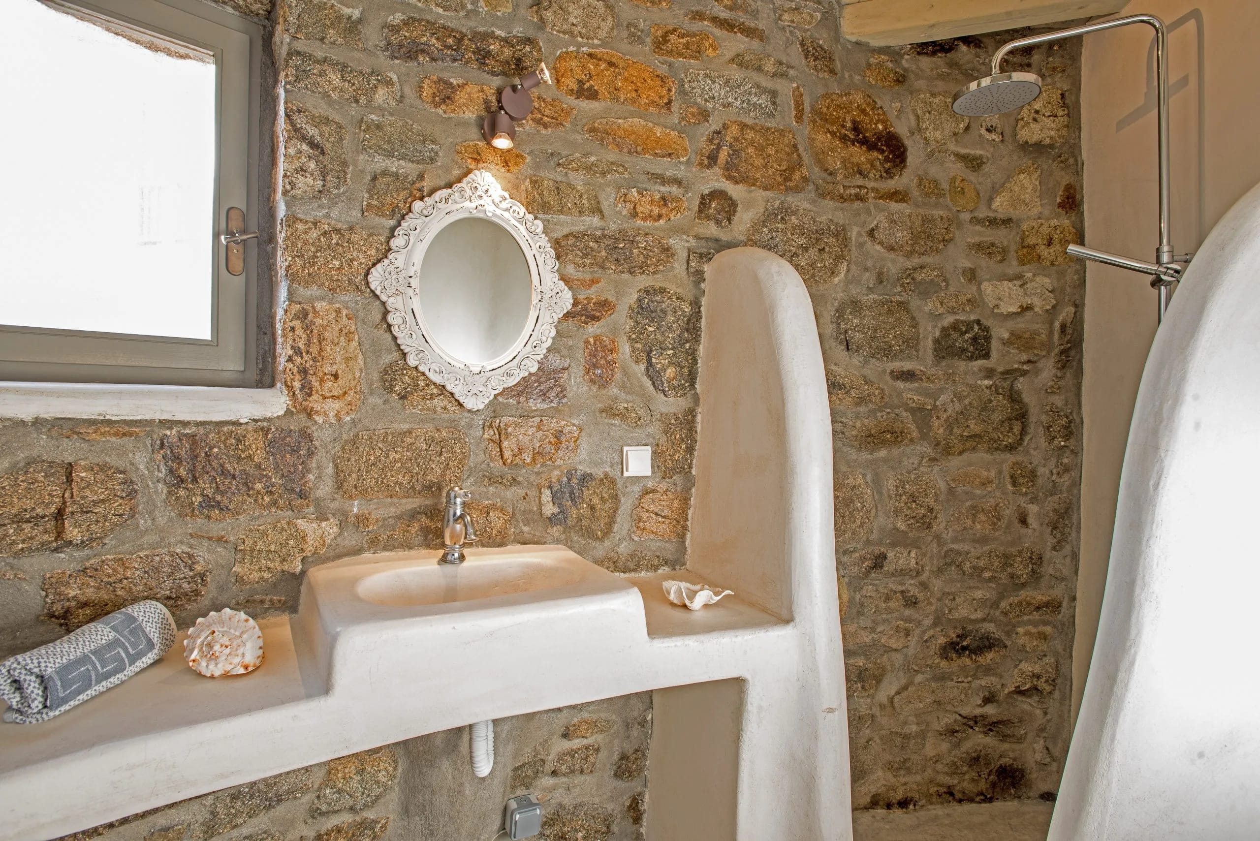 a bathroom with a sink and a toilet
