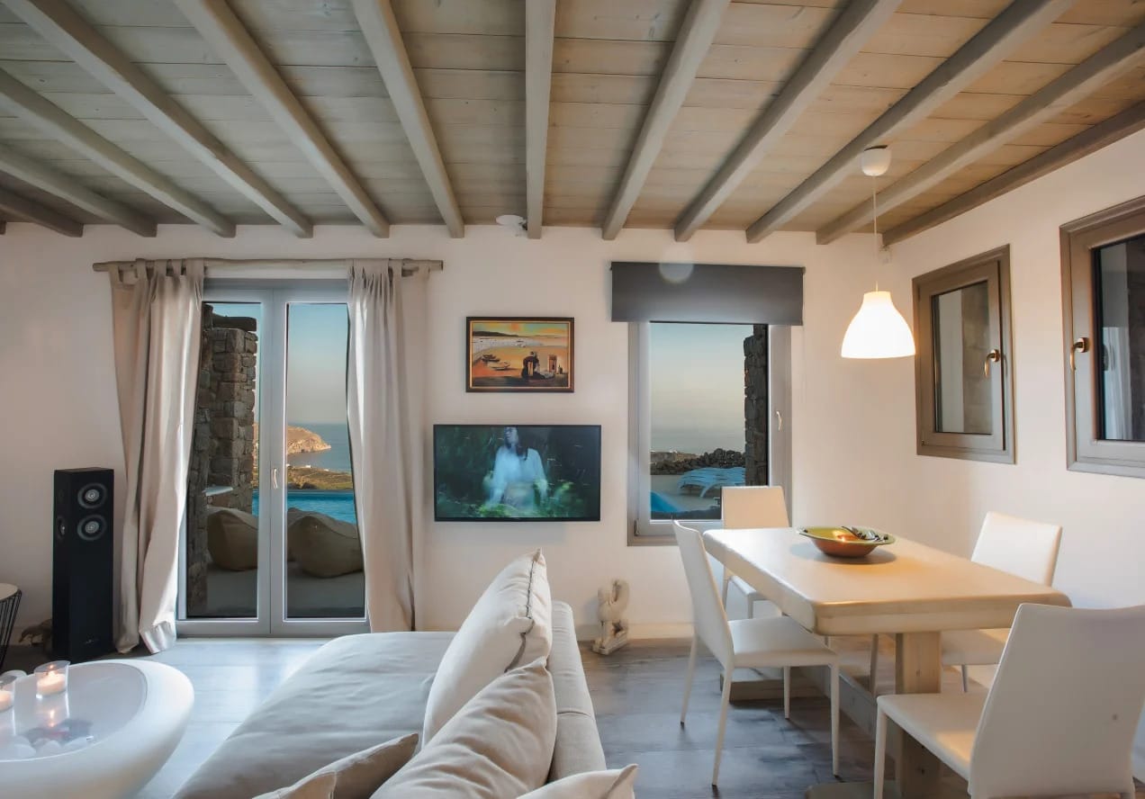 a living room with a couch and a table