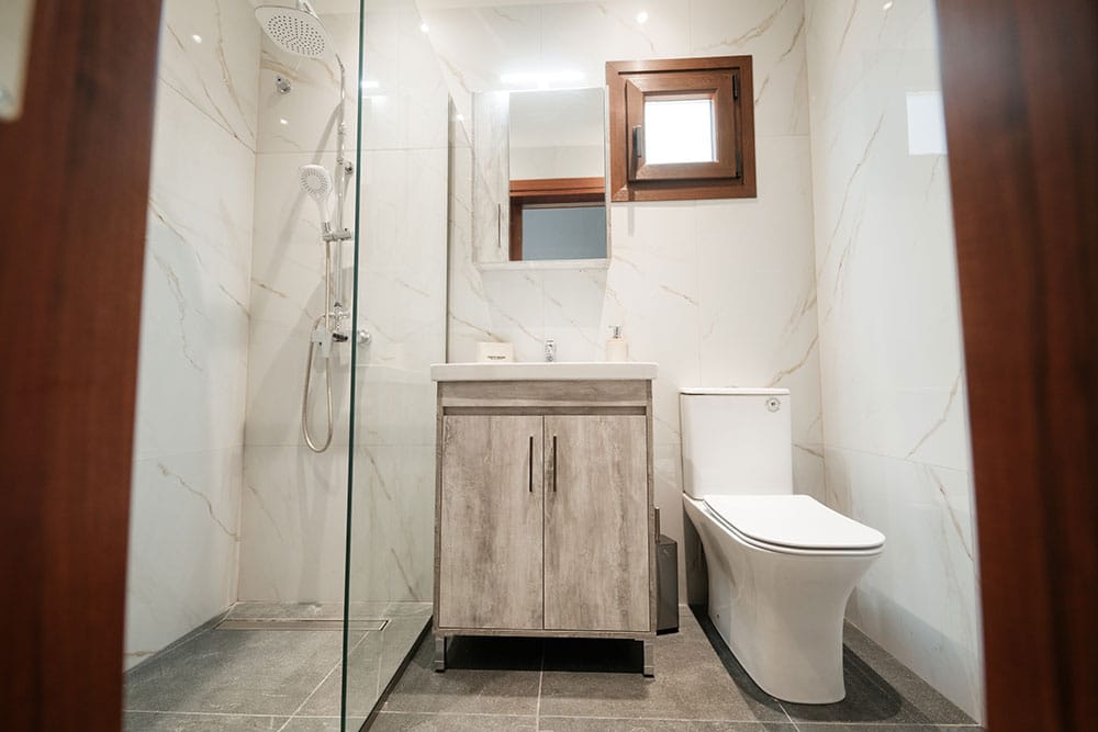 a bathroom with a toilet and sink