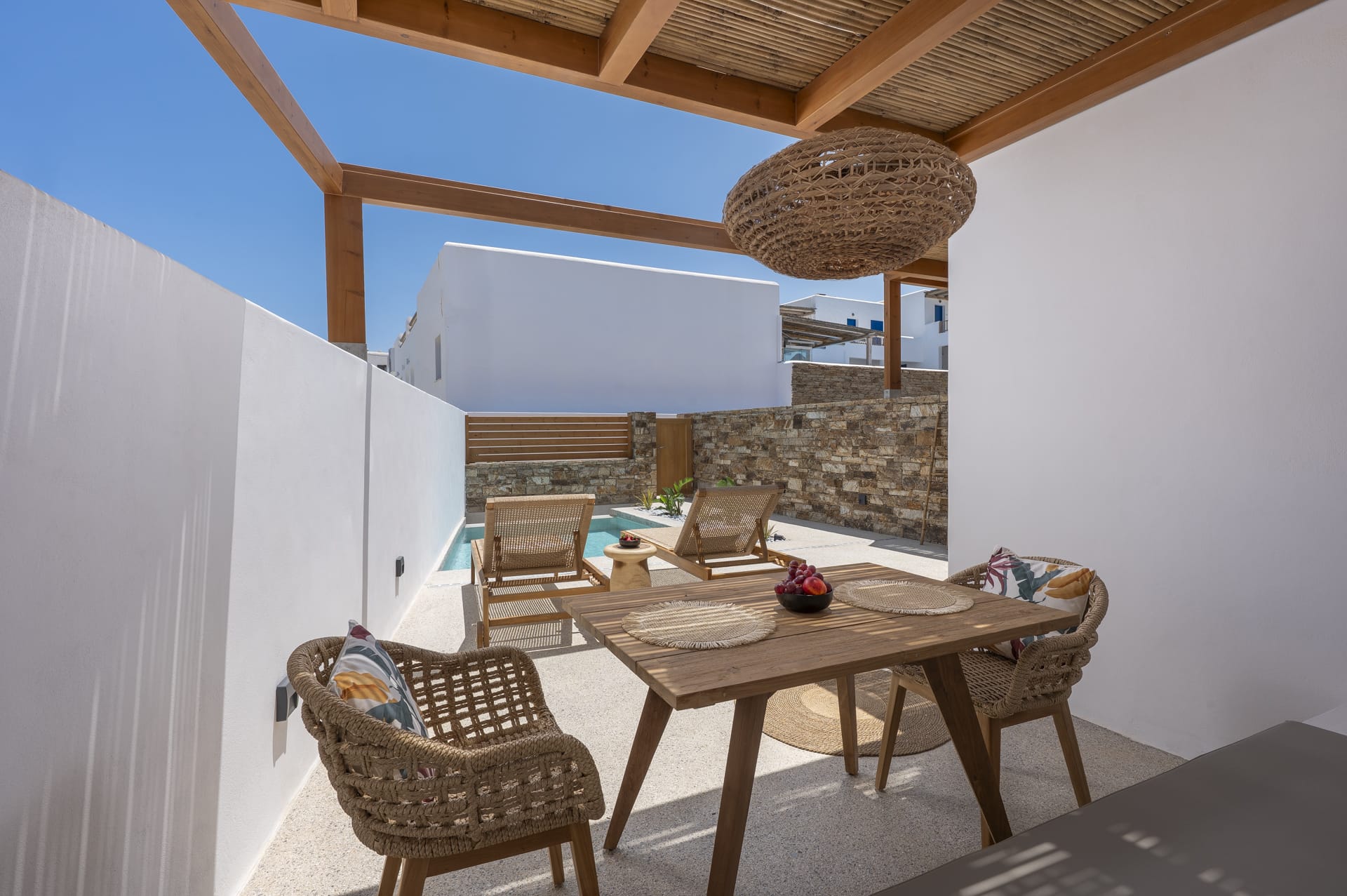 a table with chairs and a basket on it