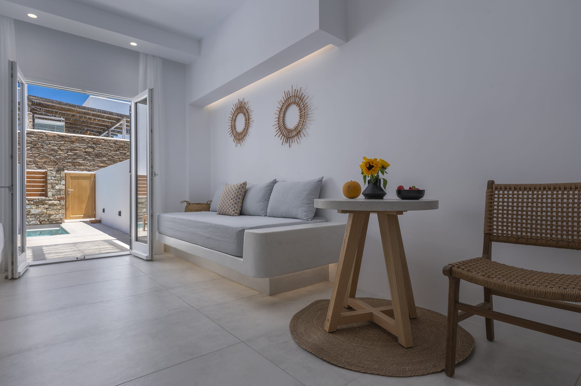 a living room with a couch and a table