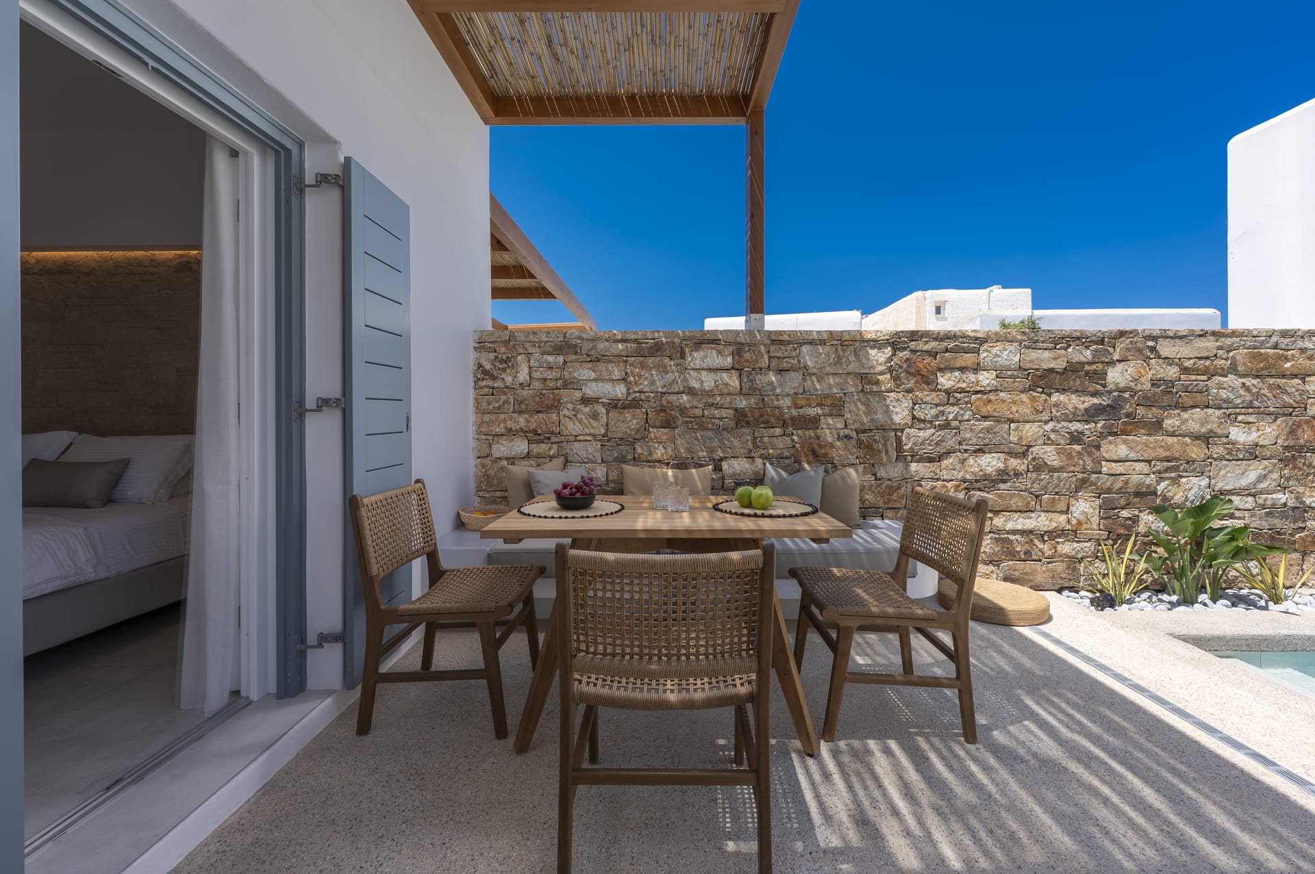 a table and chairs on a deck