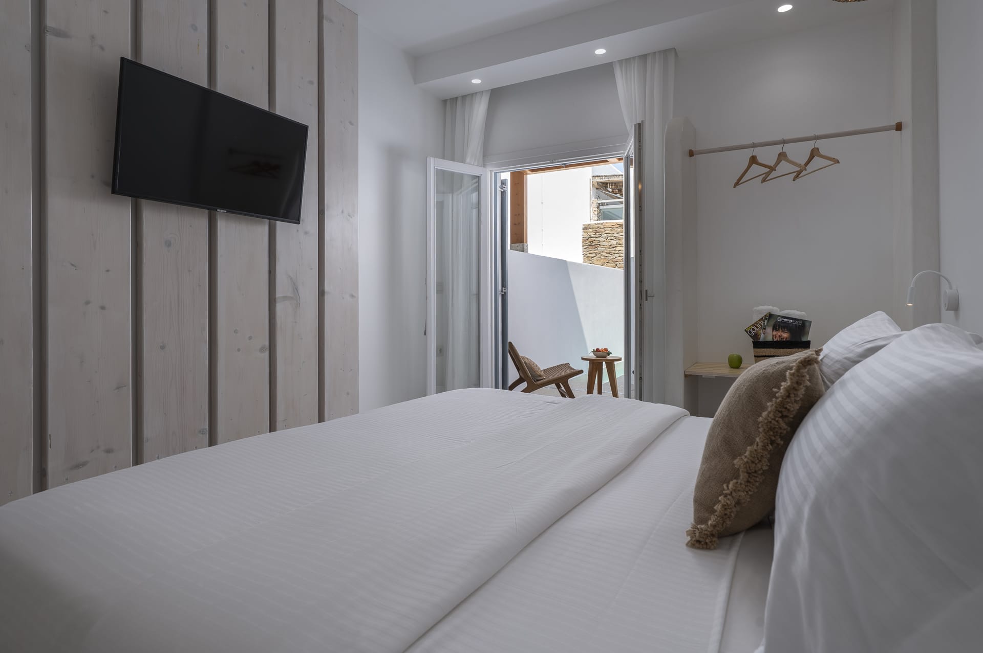 a hotel room with a large mirror
