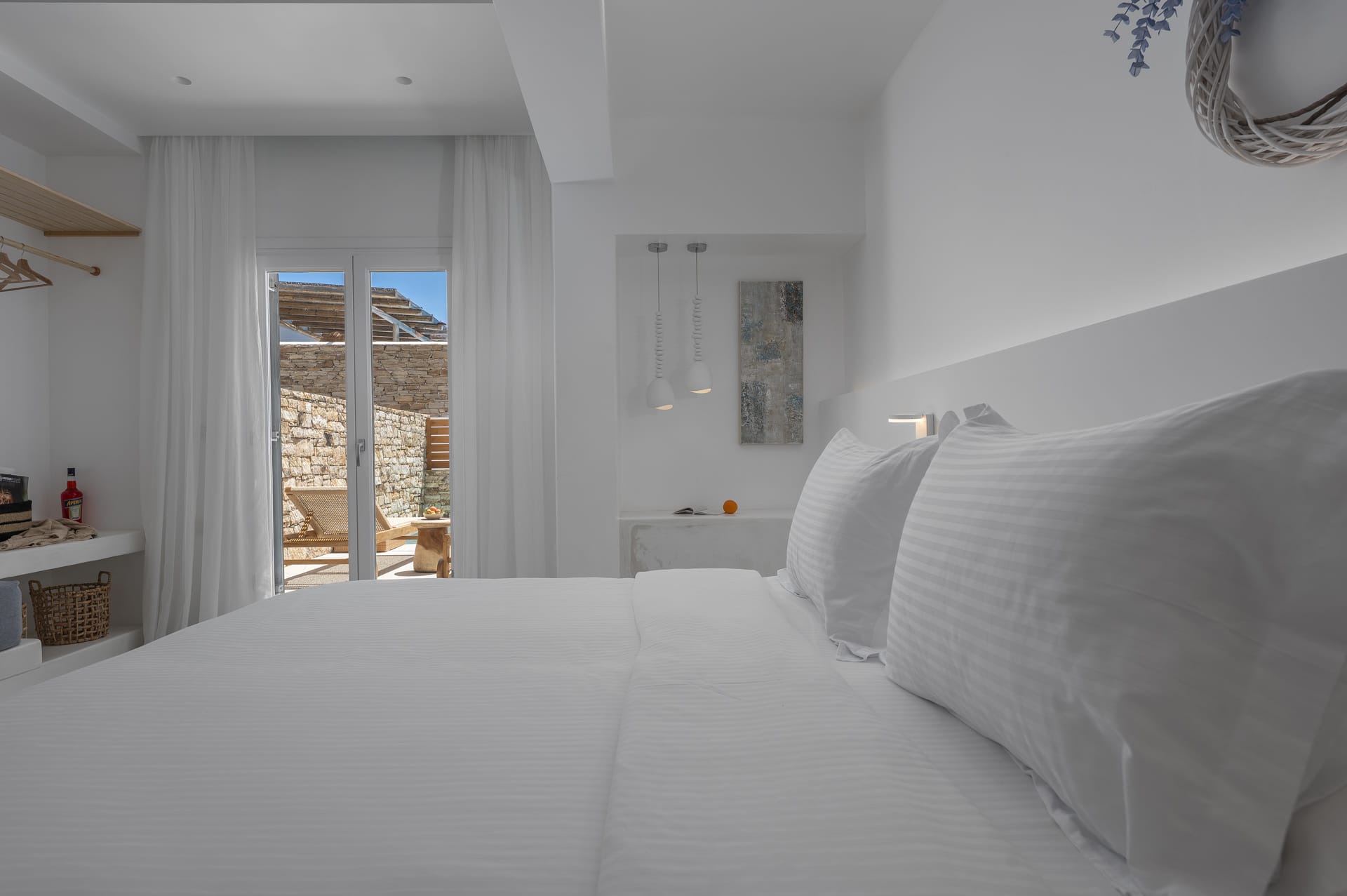 a bedroom with a large window