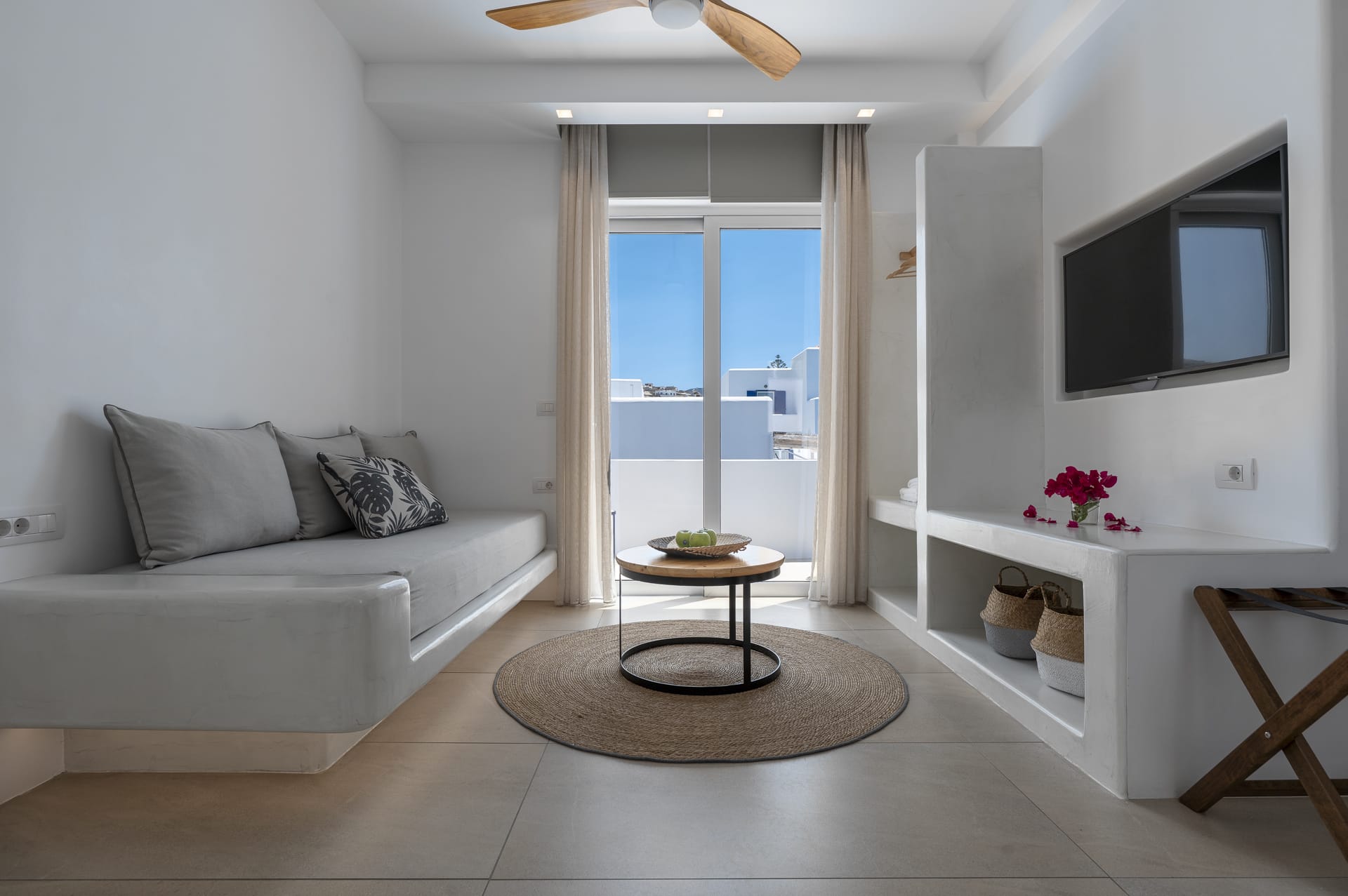 a living room with a tv and a couch