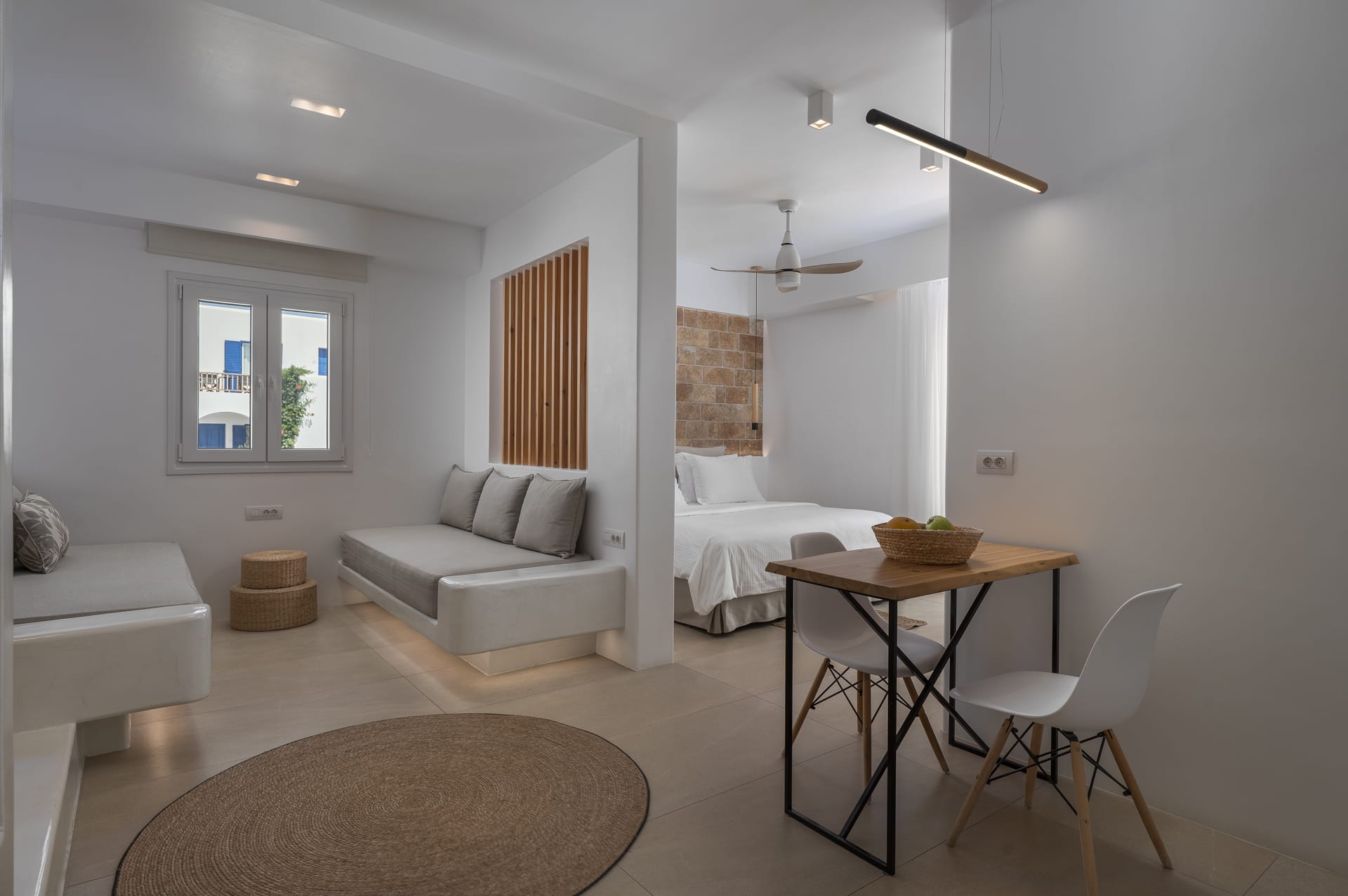 a living room with a couch and a table