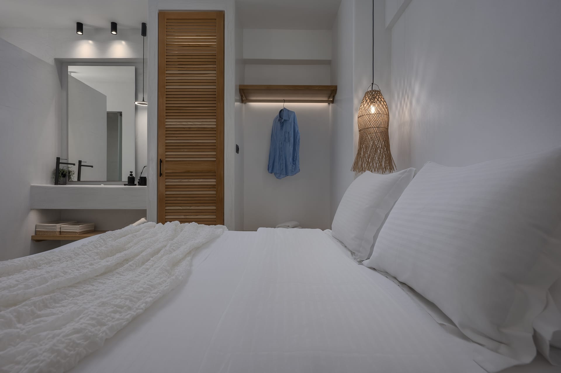 a bed with white sheets