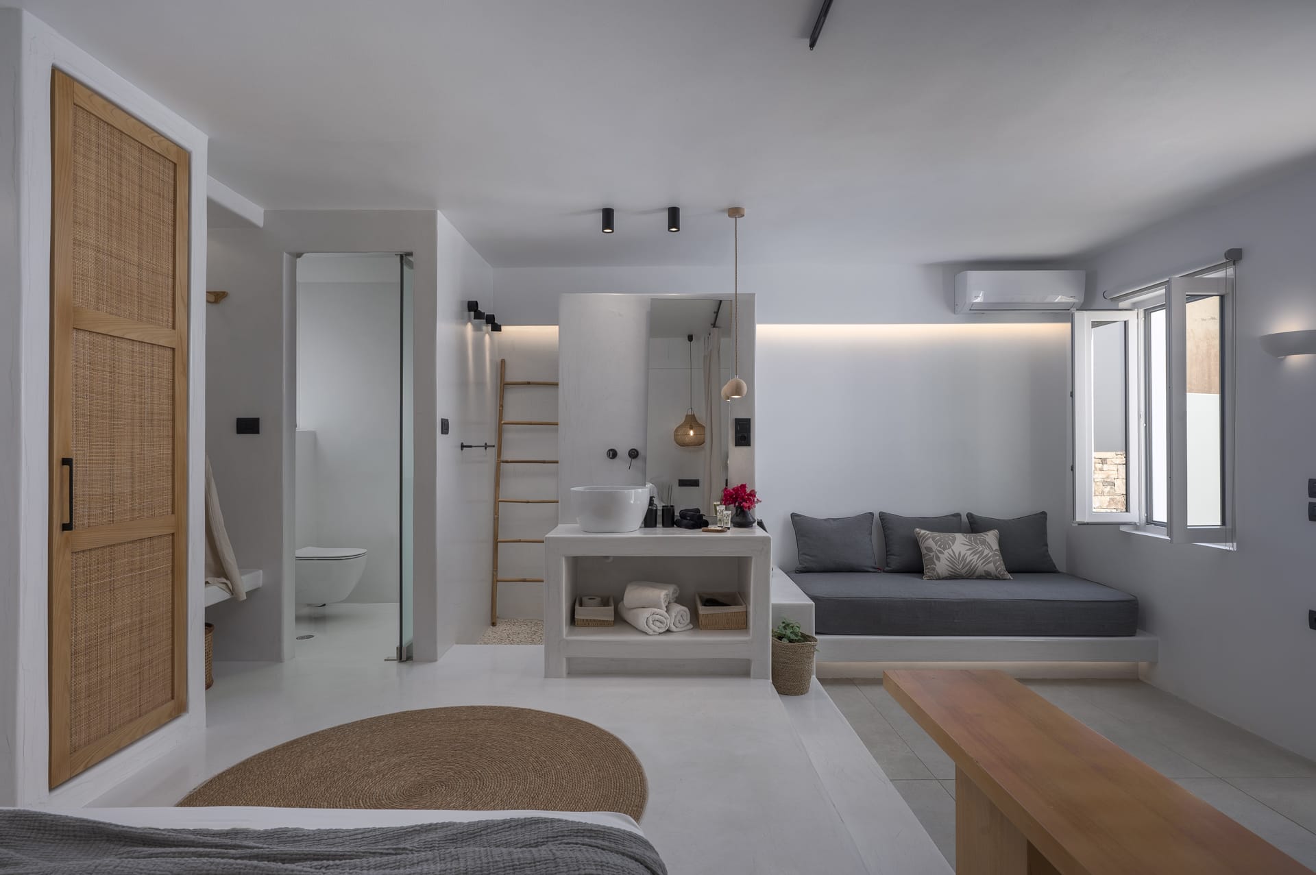 a living room with a couch and a table