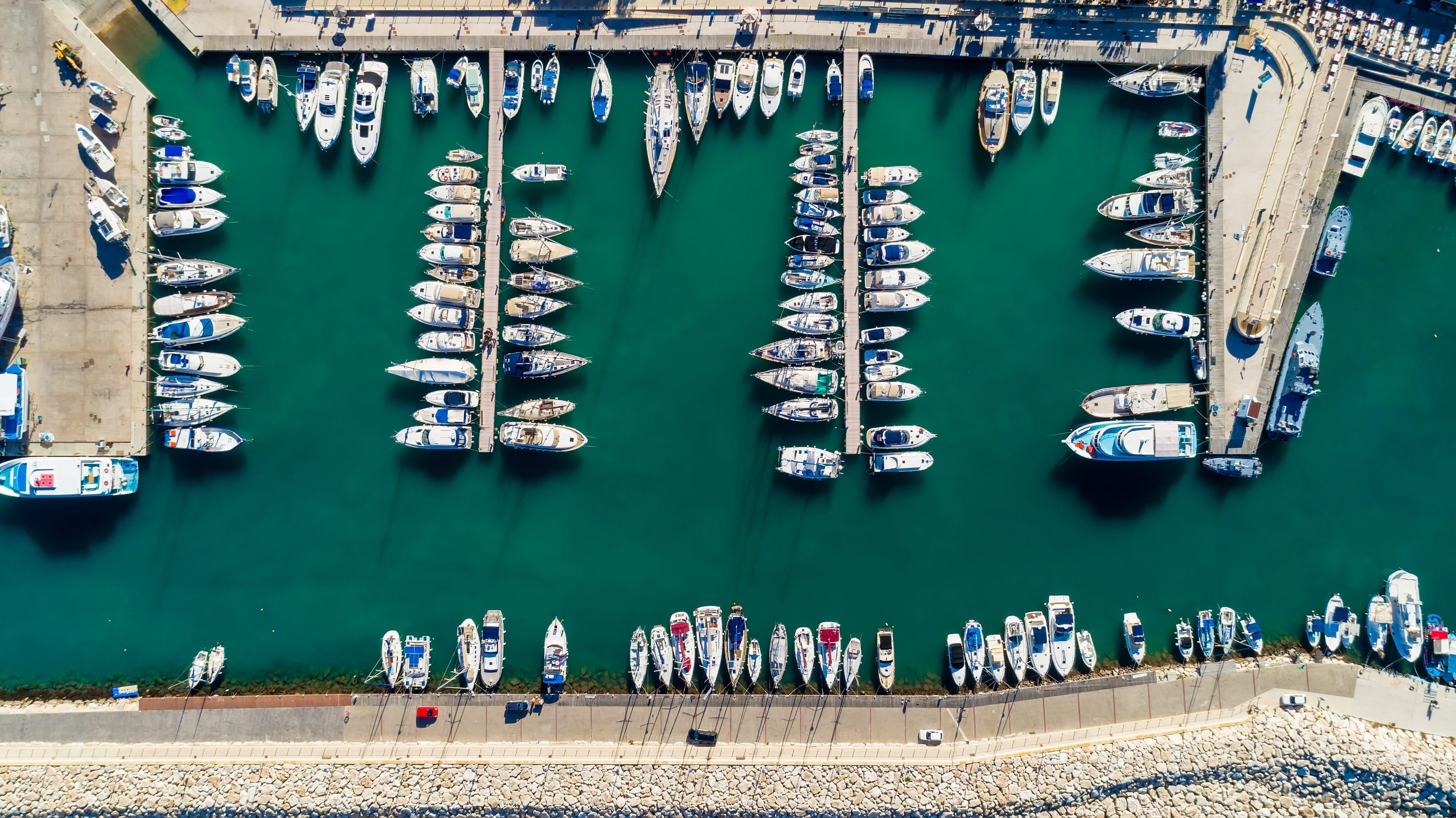 a group of sailboats in the water
