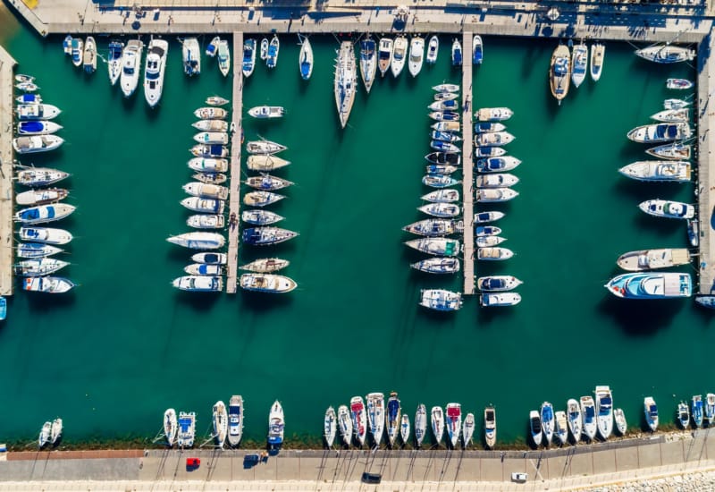 a group of sailboats in the water