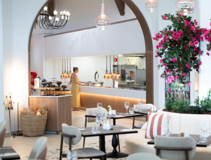 a room with a table and chairs