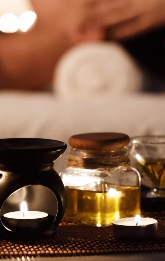 a group of candles and glasses