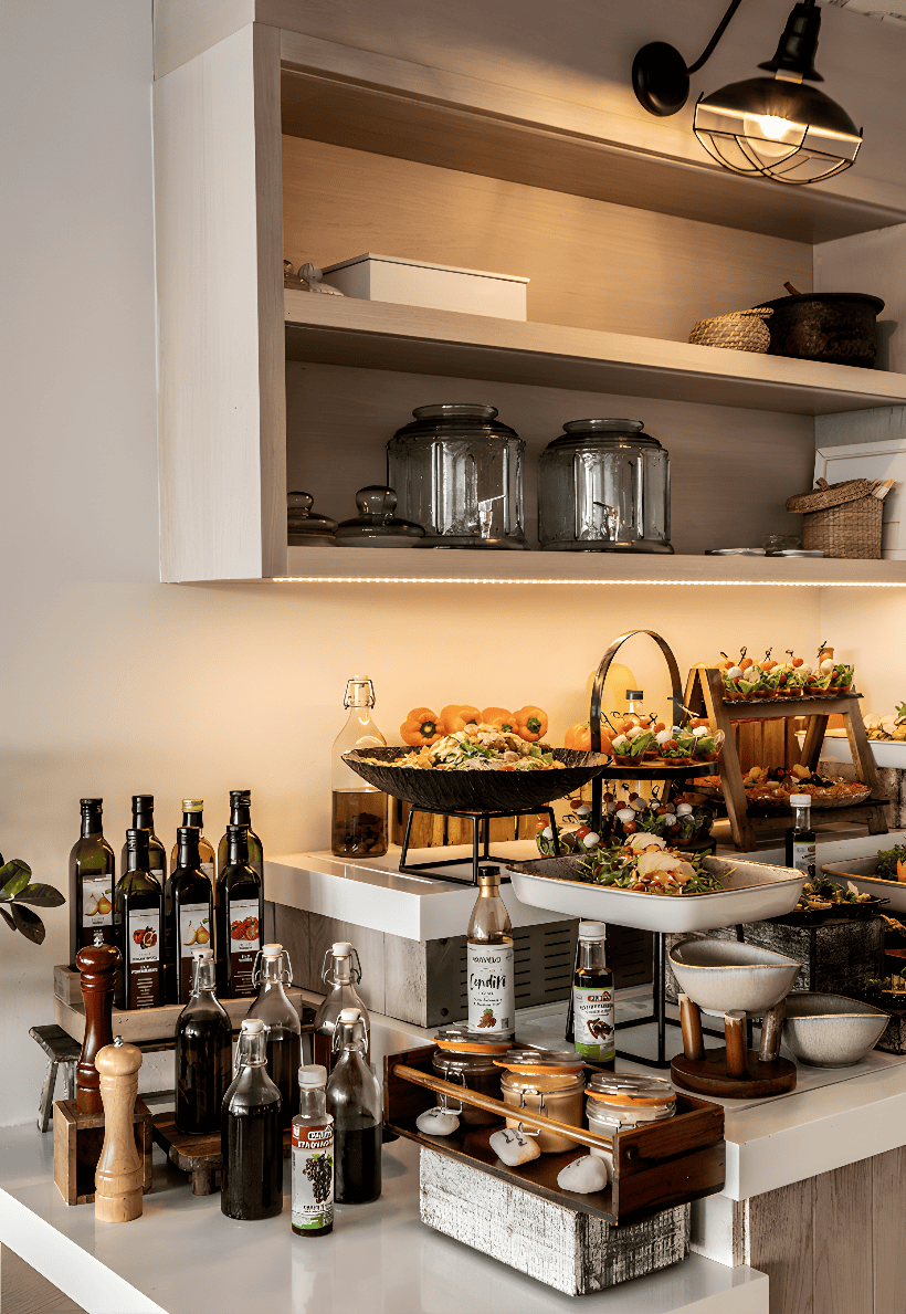 a kitchen with many bottles of alcohol
