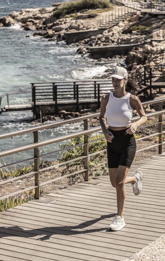 a person running on a bridge