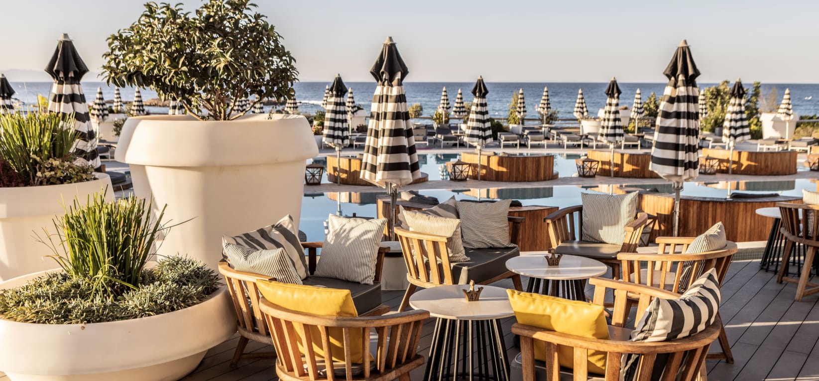 a patio with chairs and tables