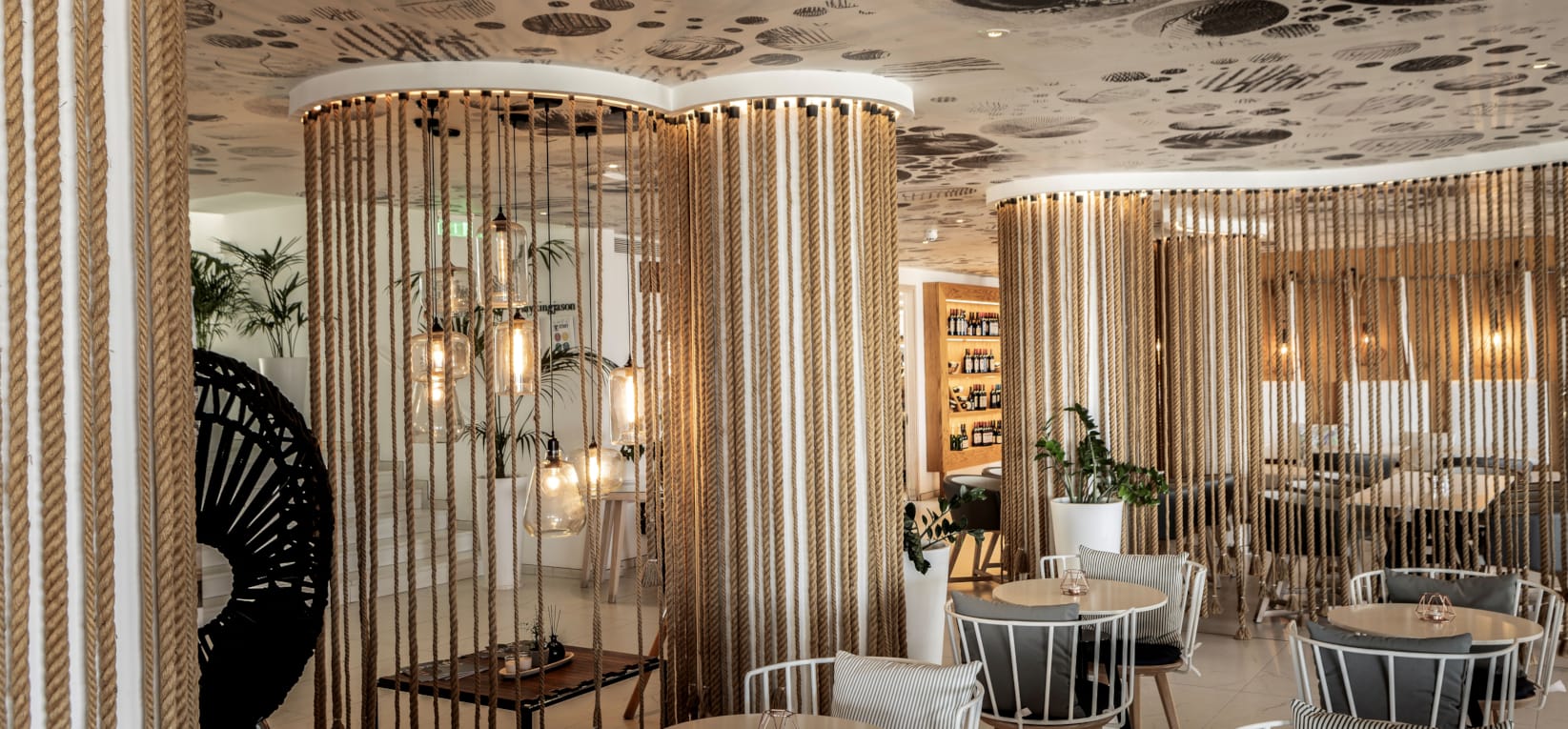 a room with tables and chairs