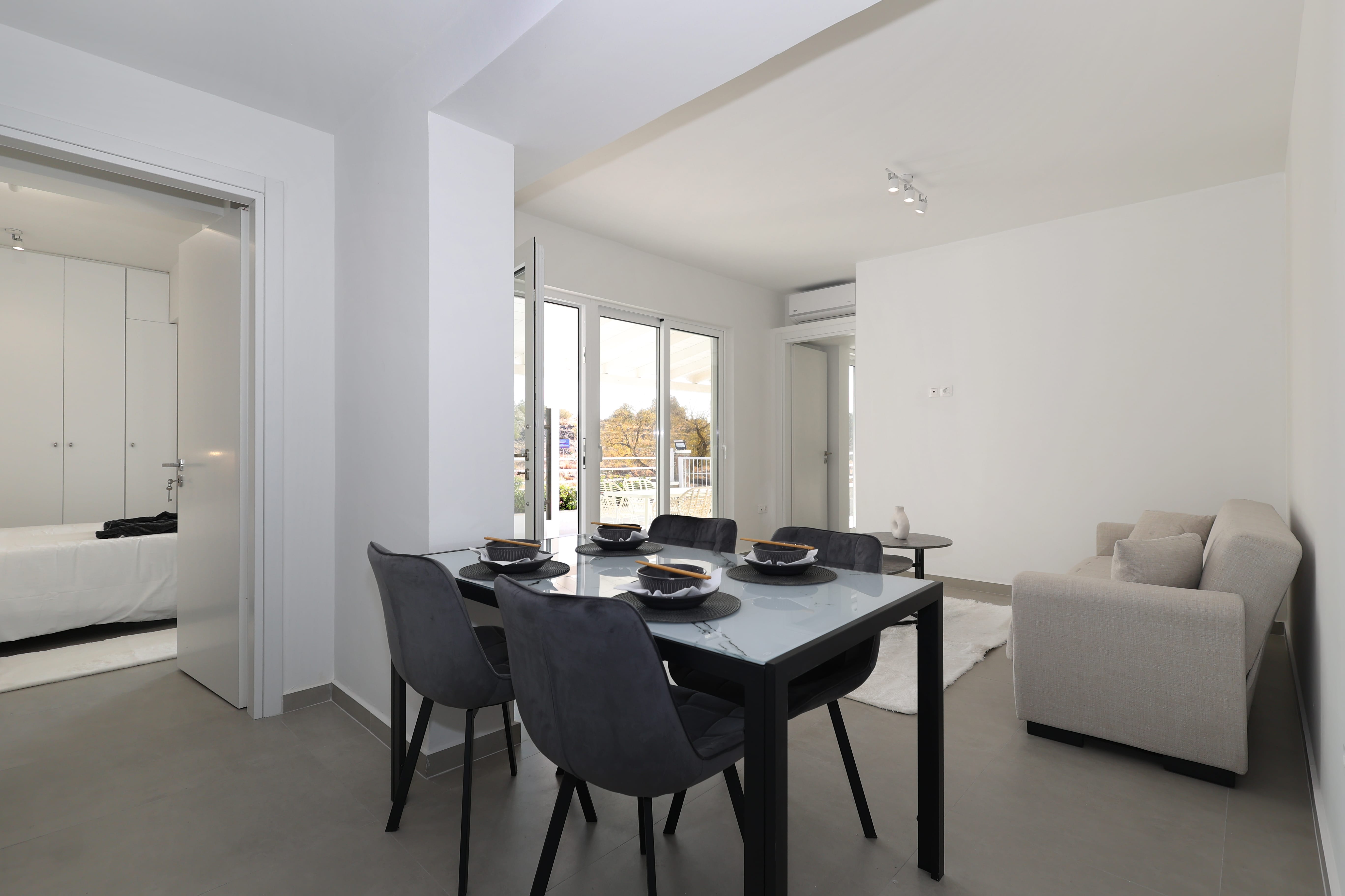 a room with a table and chairs