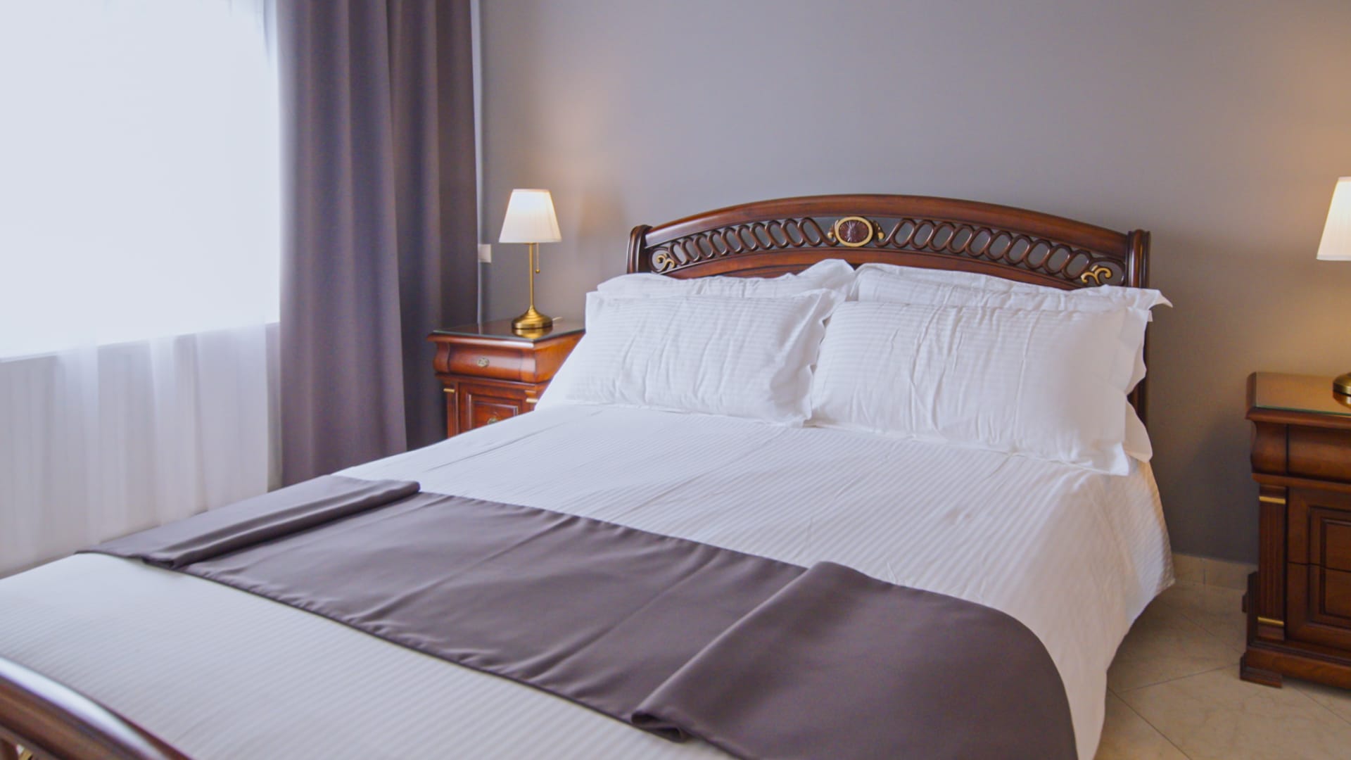 a bed with white sheets