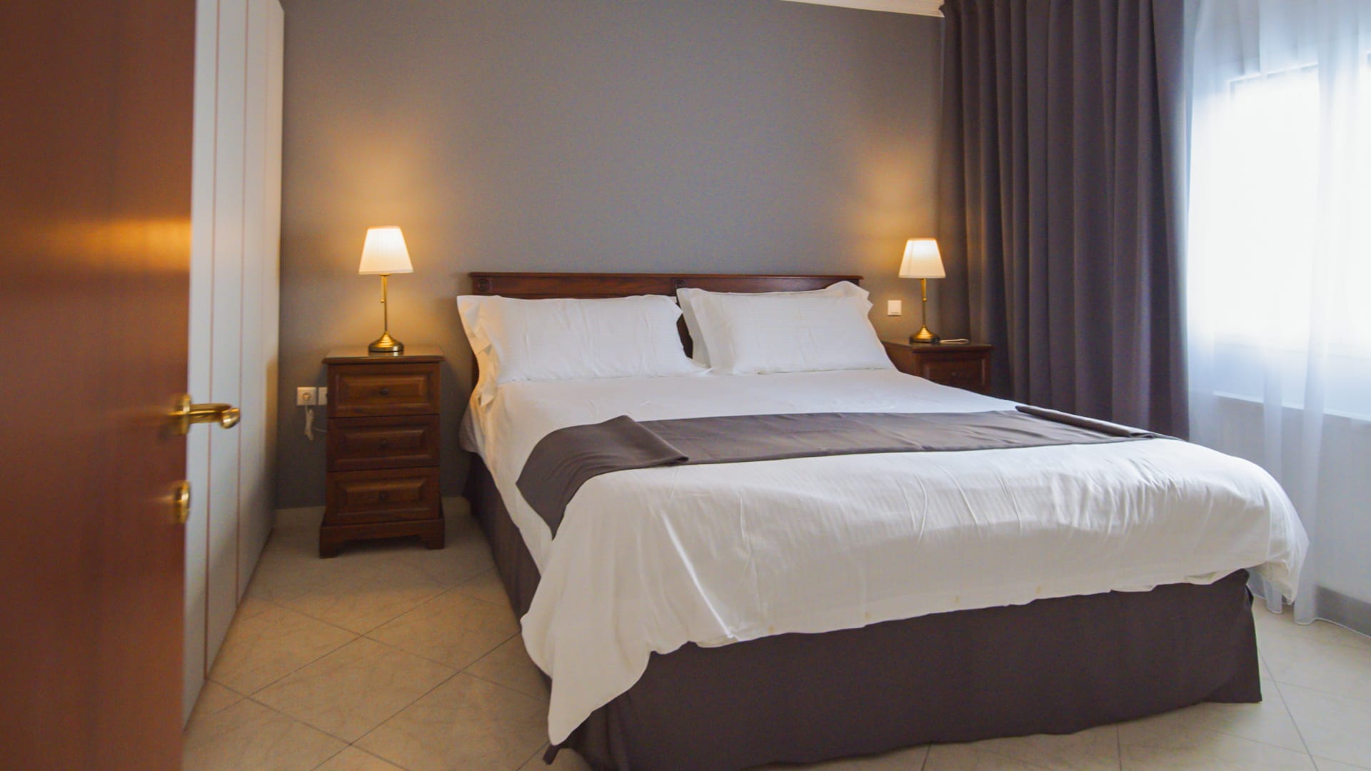 a hotel room with two beds