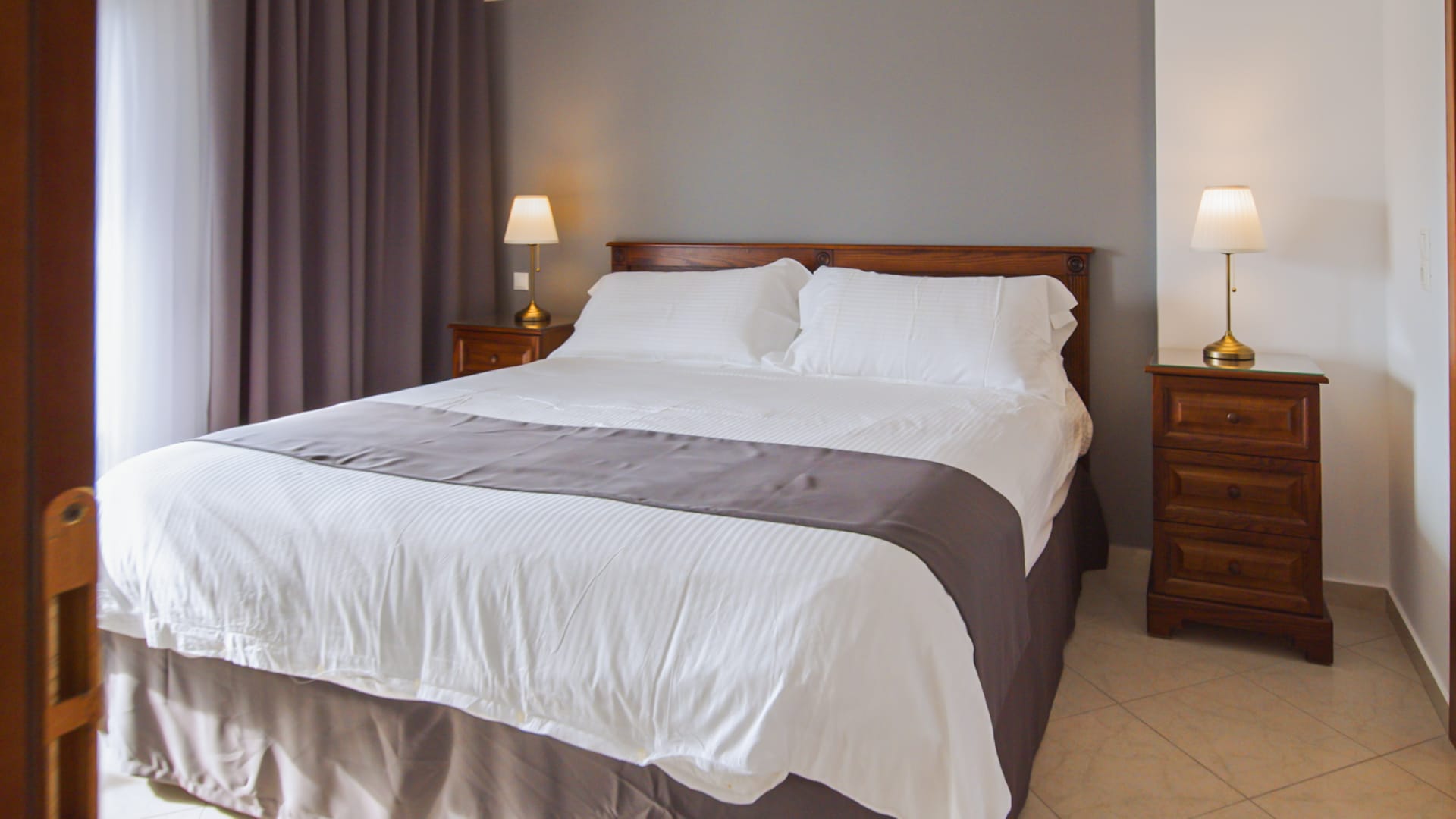 a bed with a white sheet