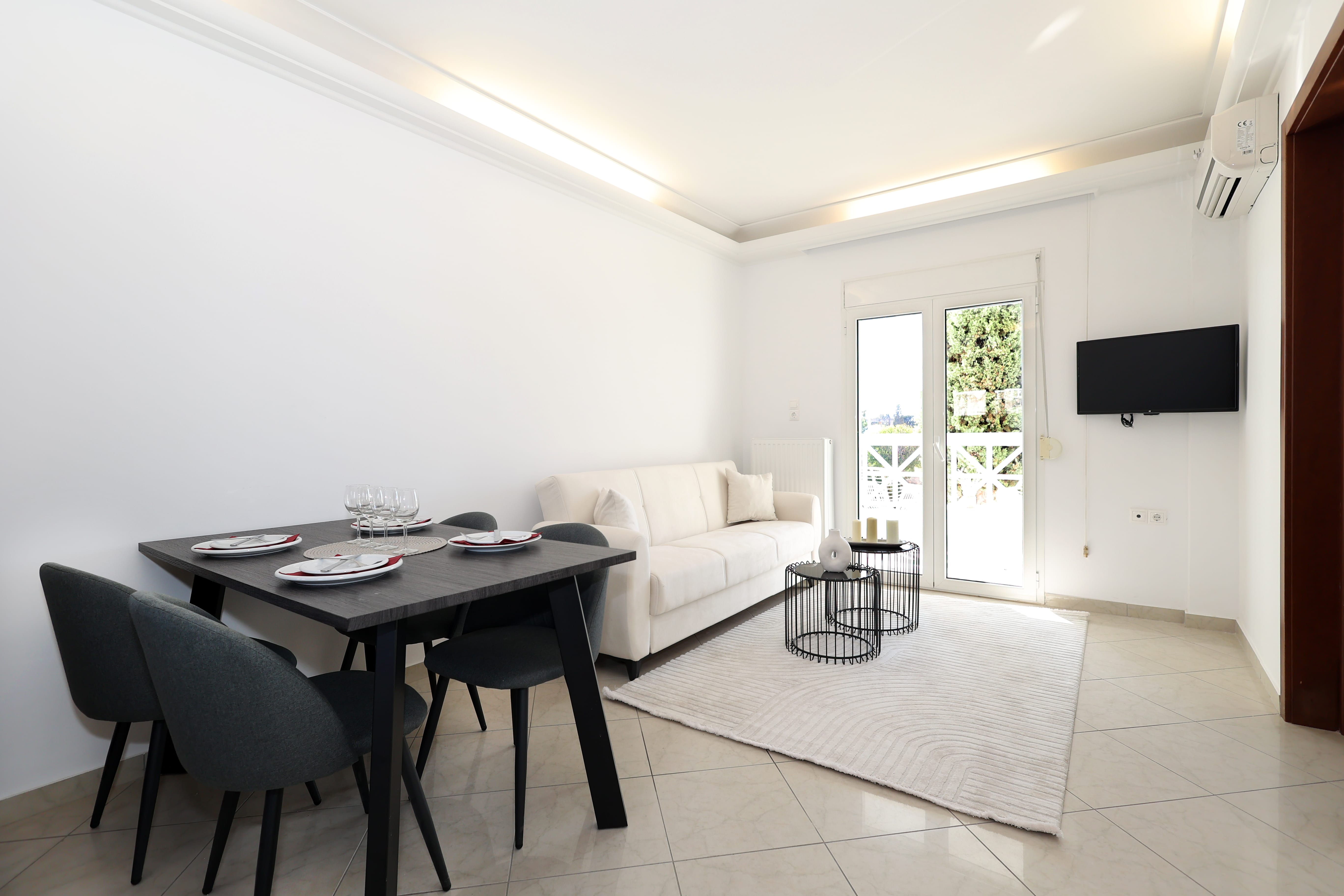 a living room with a couch and table