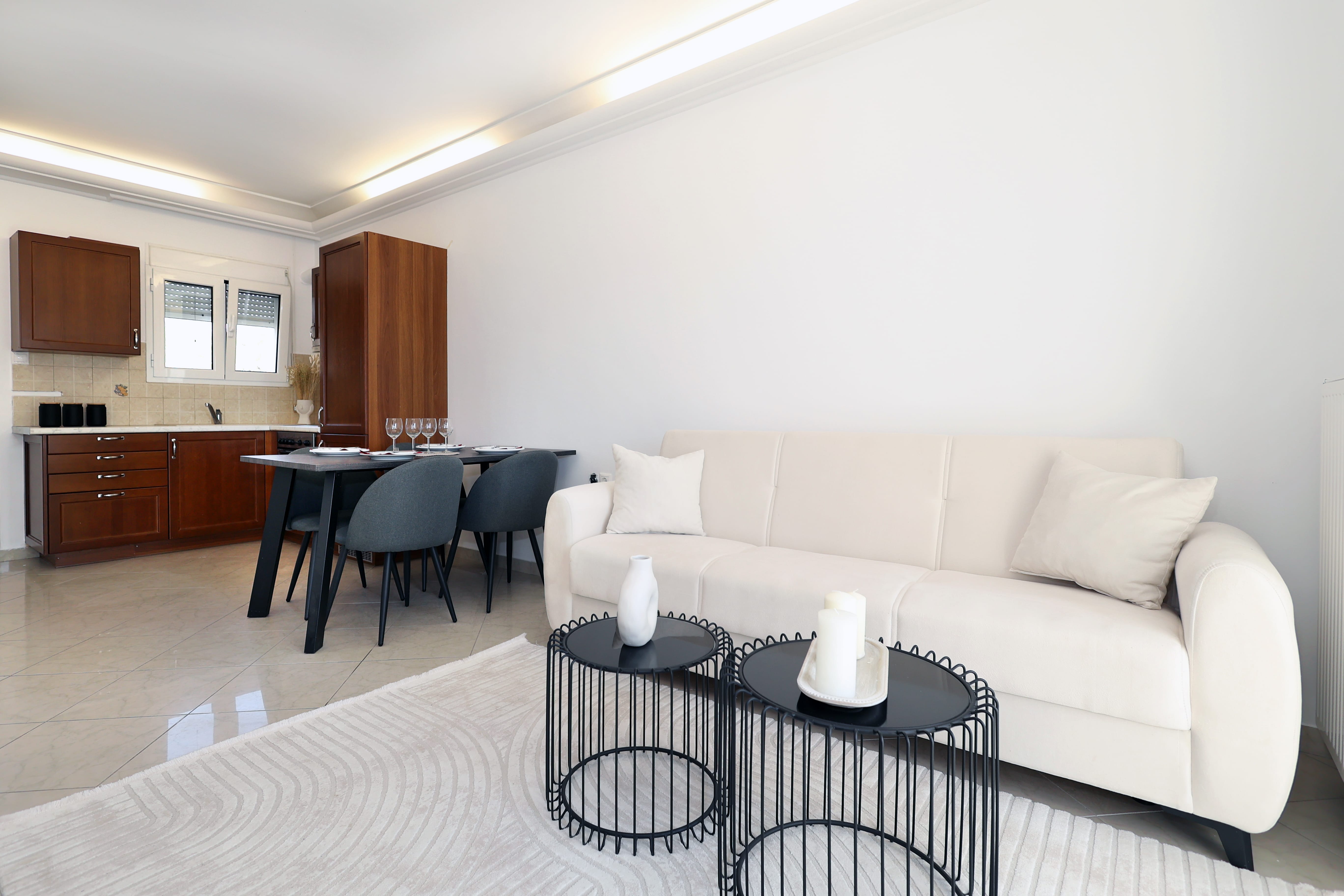 a living room with a couch and table