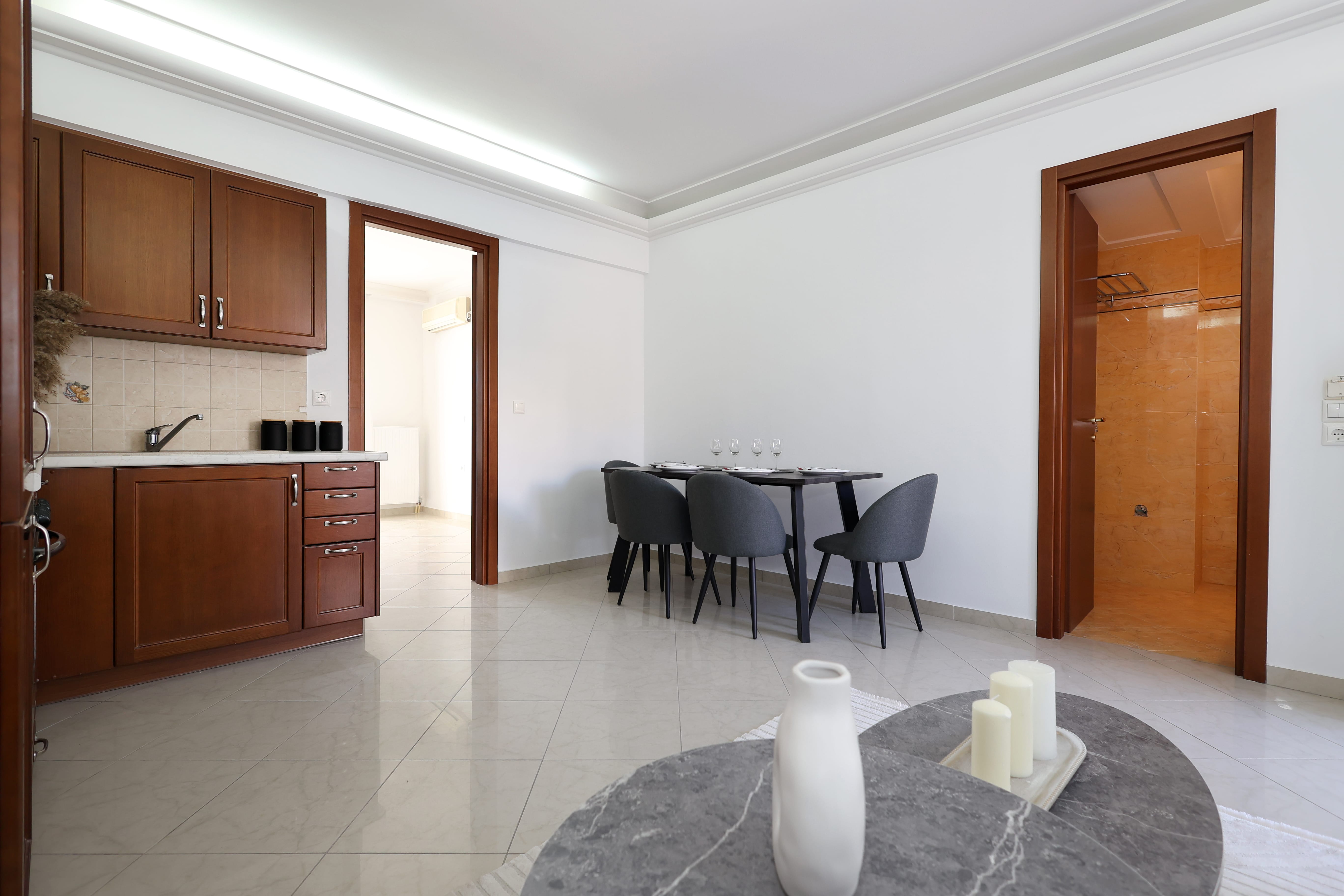 a kitchen with a dining table