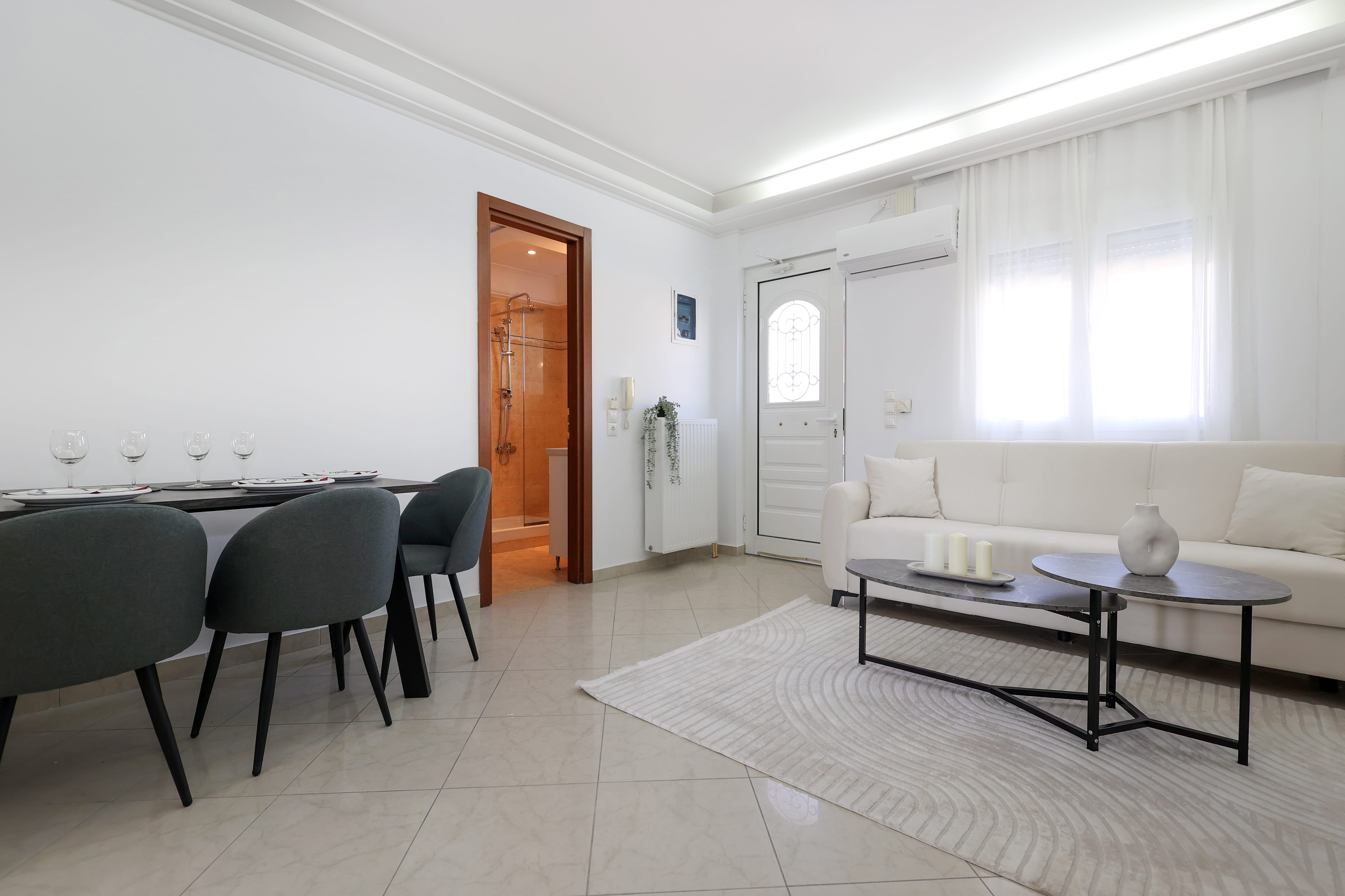 a room with a table and chairs