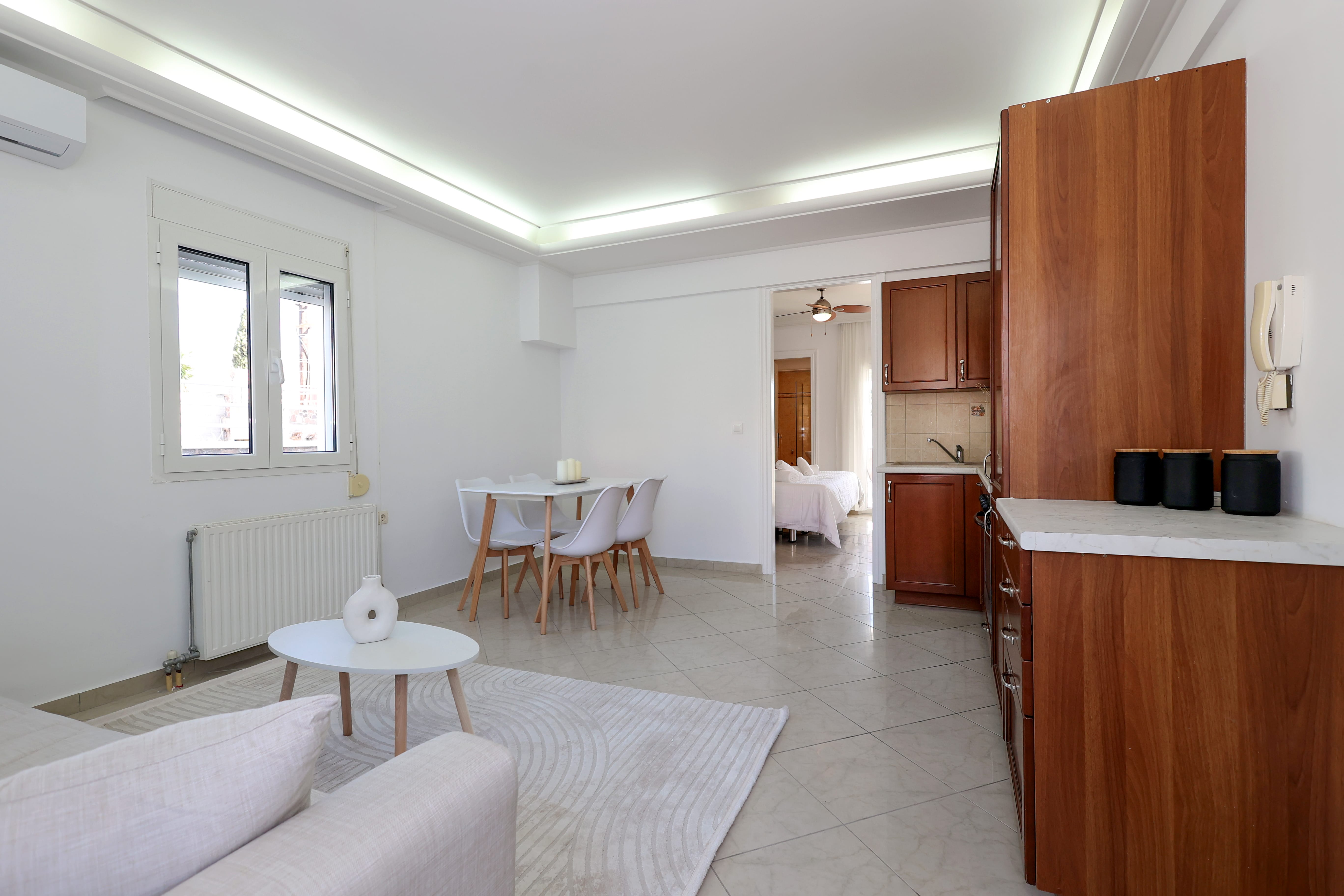 a room with a table and chairs