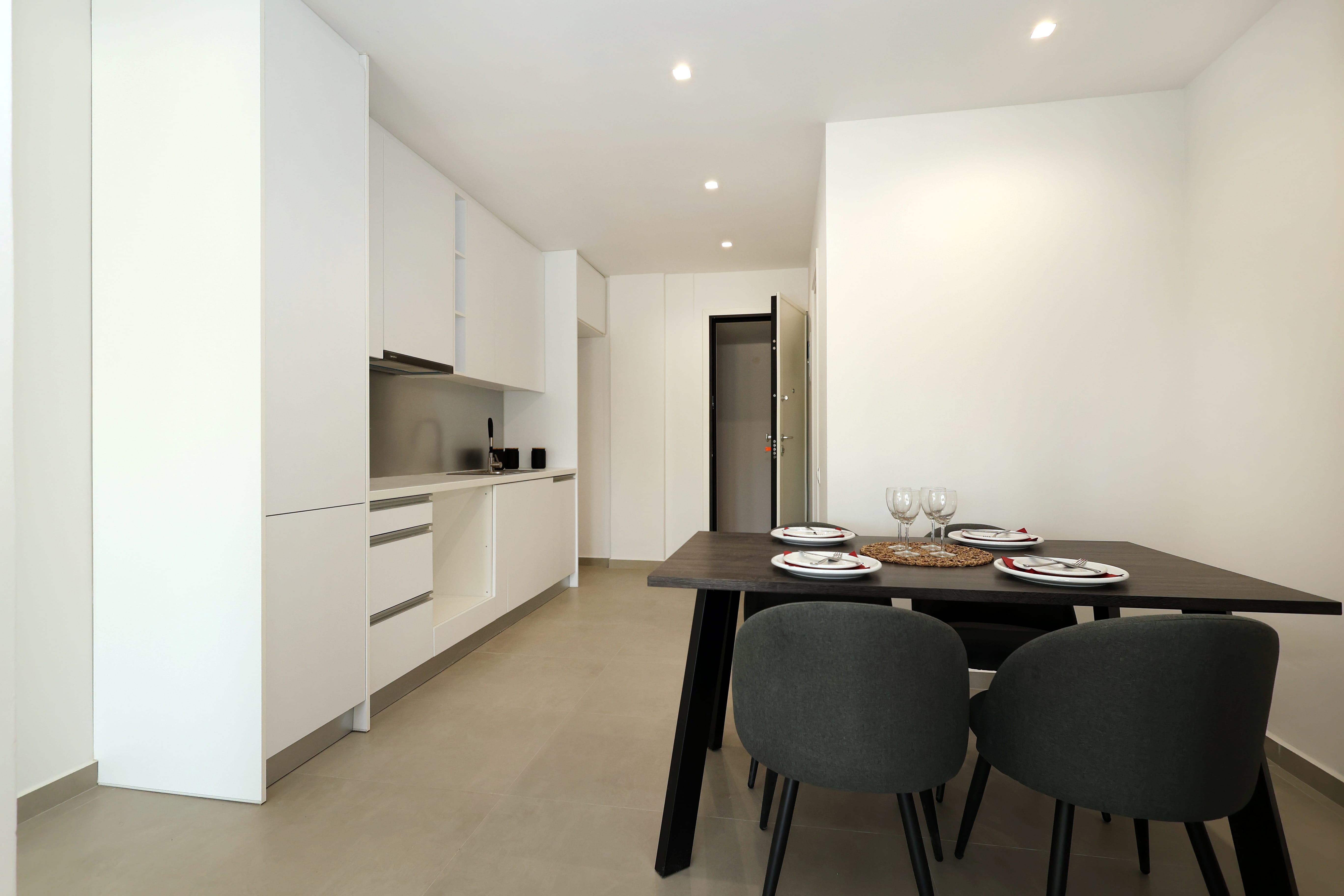a kitchen with a dining table
