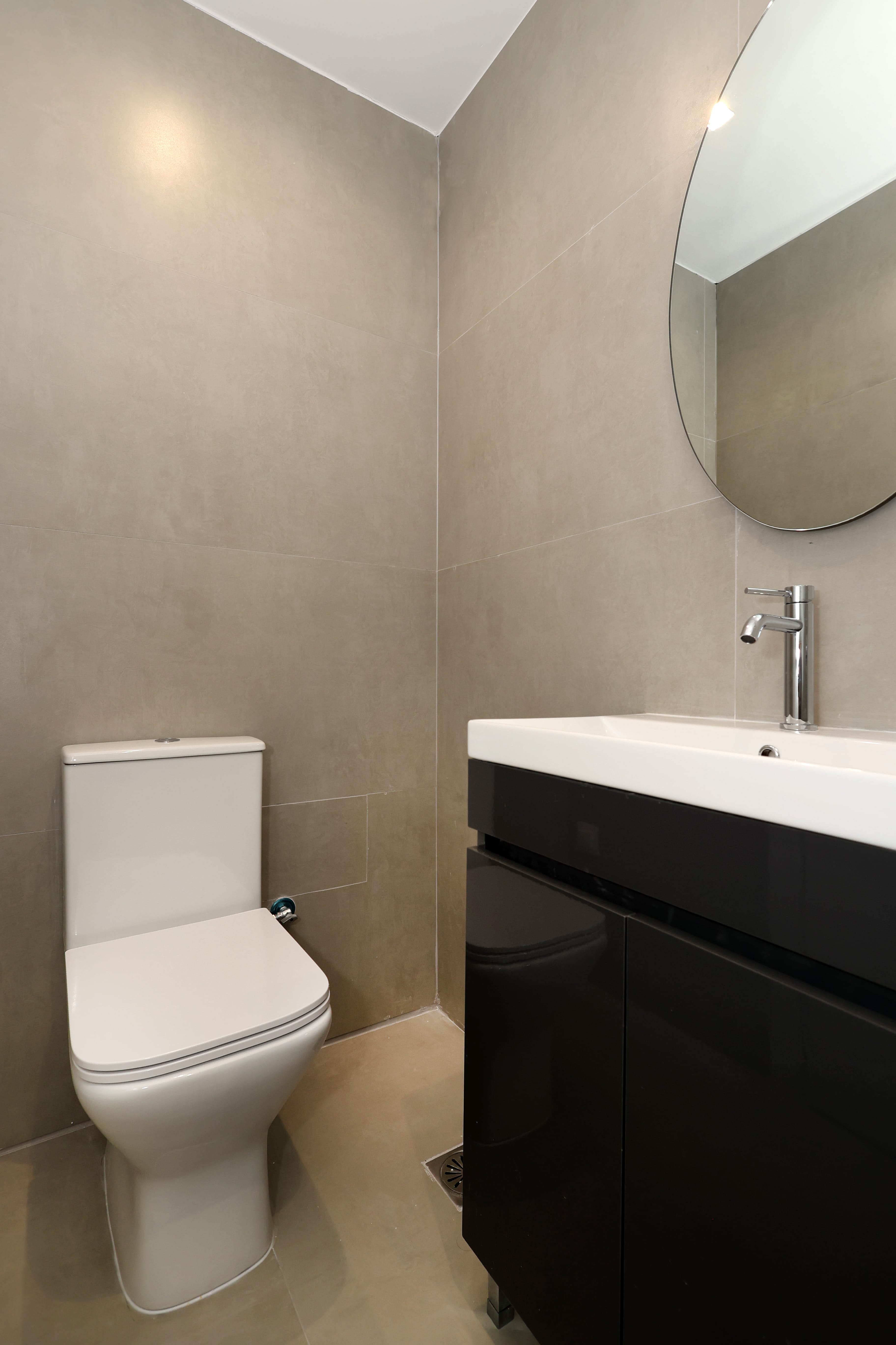 a bathroom with a toilet and sink